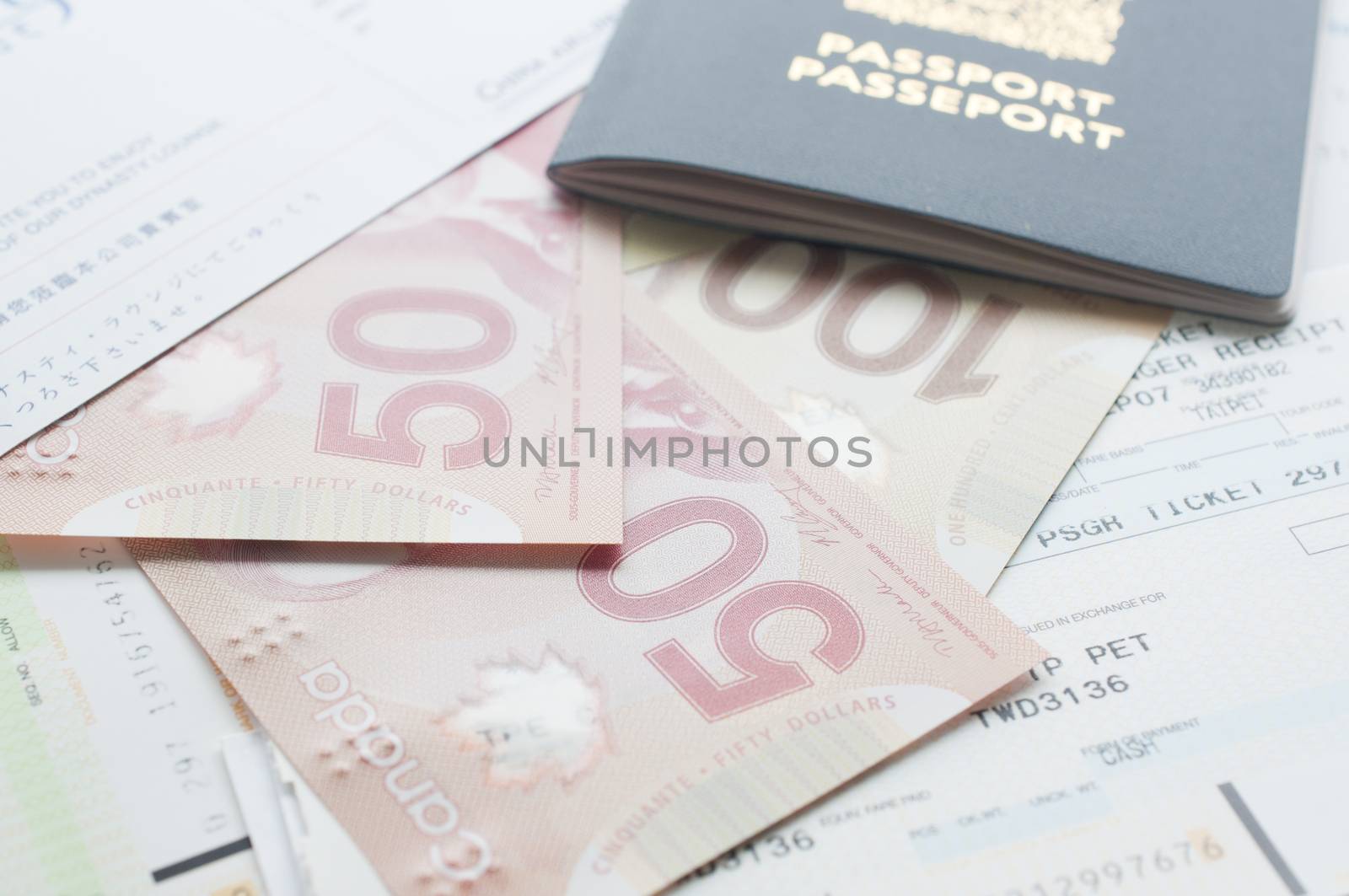 Canada passport with boarding pass on the table 