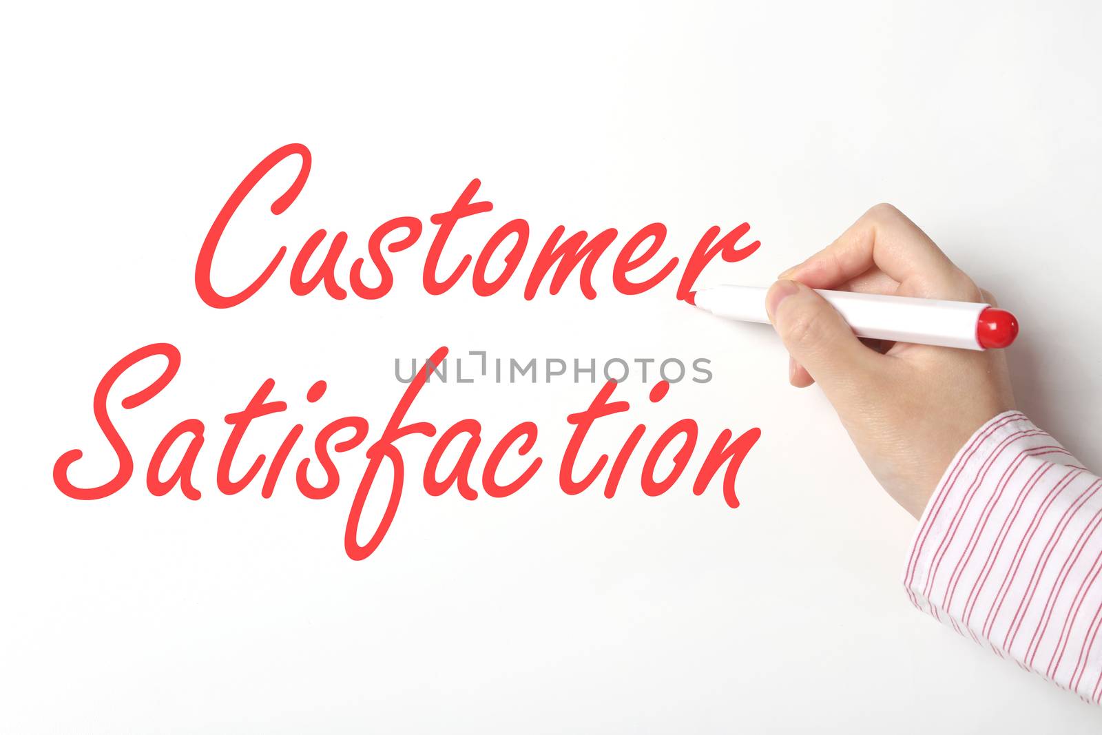 Writing customer satisfaction word on whiteboard 