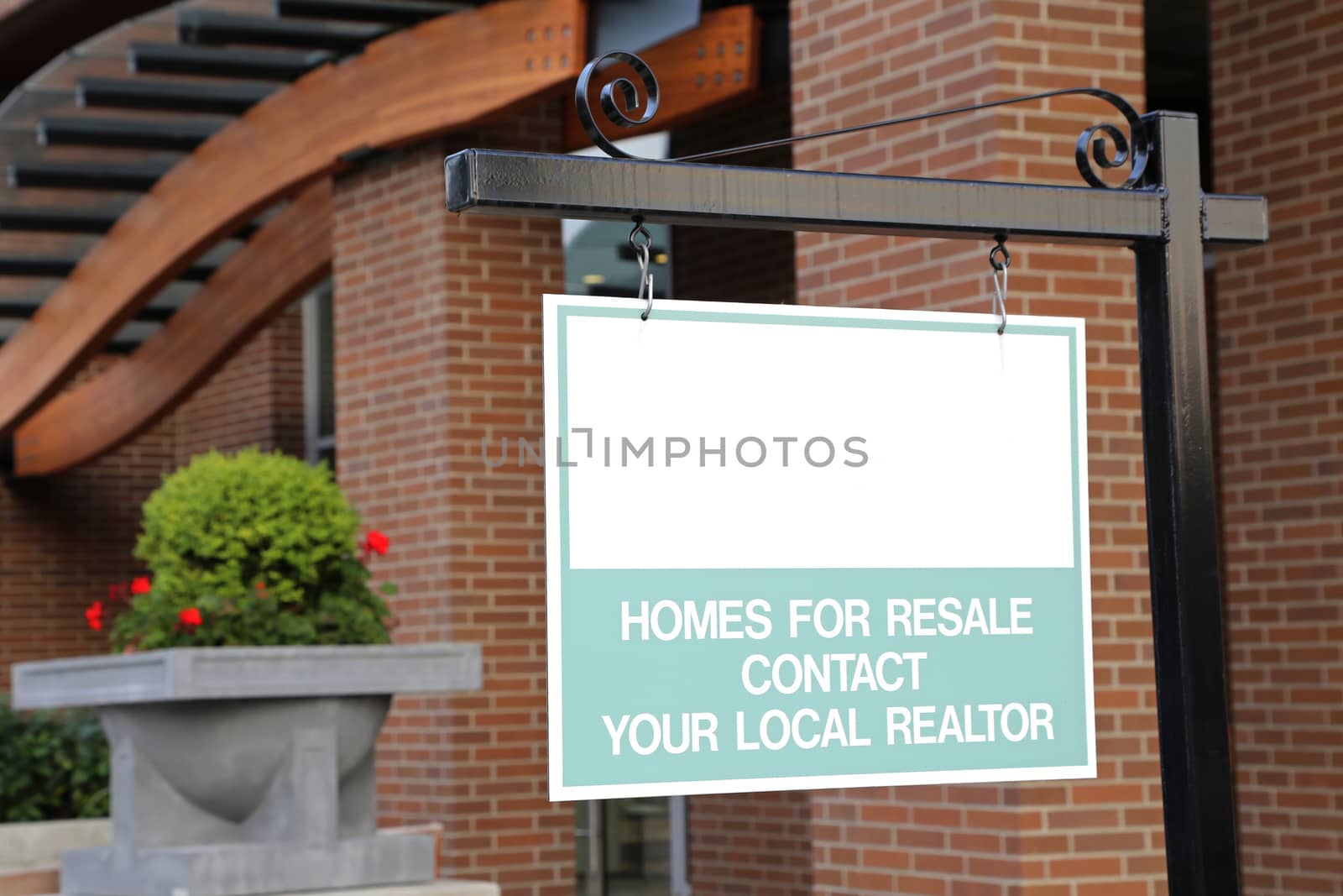 Coquitlam, BC Canada - August 24, 2014 : Empty sign for your ad with building background in Coquitlam BC Canada.