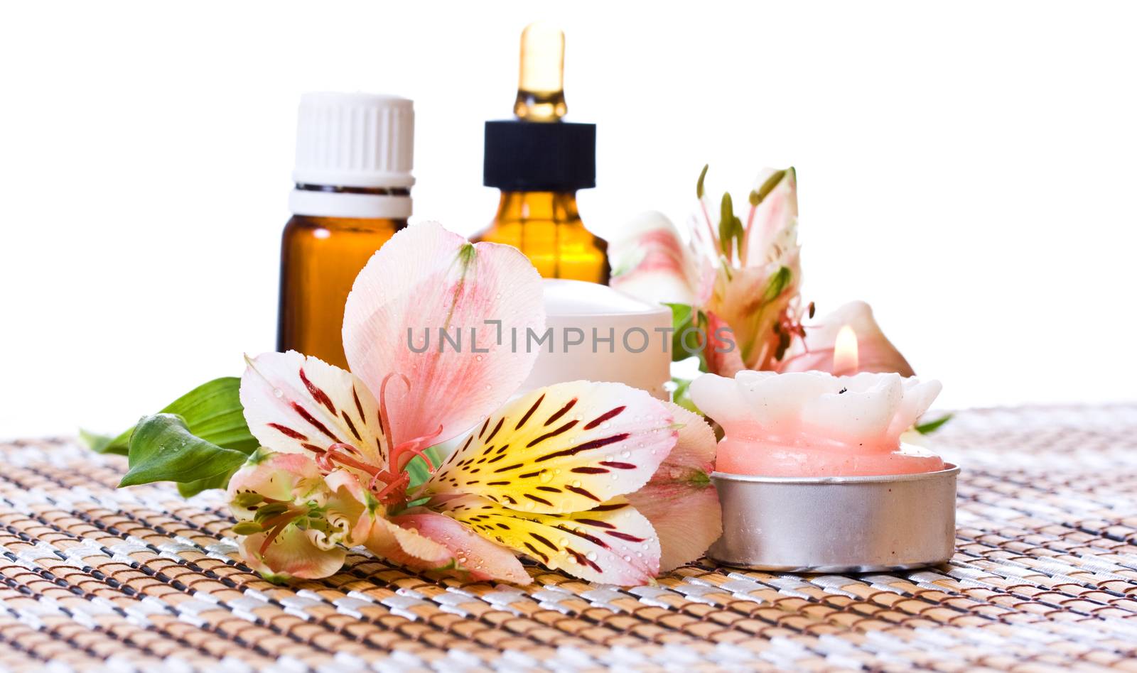 Beauty treatment - alstroemeria flowers and cosmetics