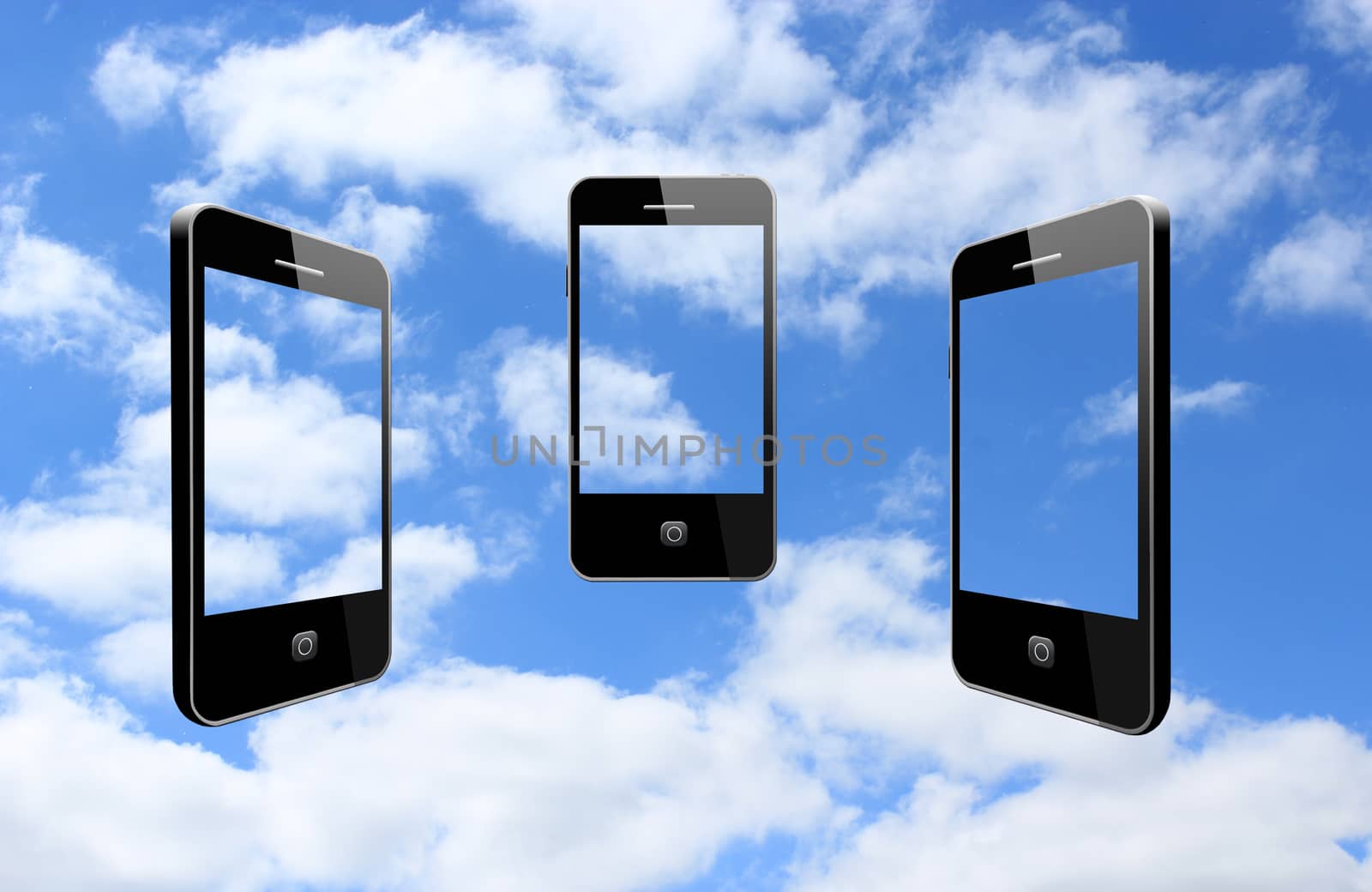 three modern mobile phones on the cloudy sky