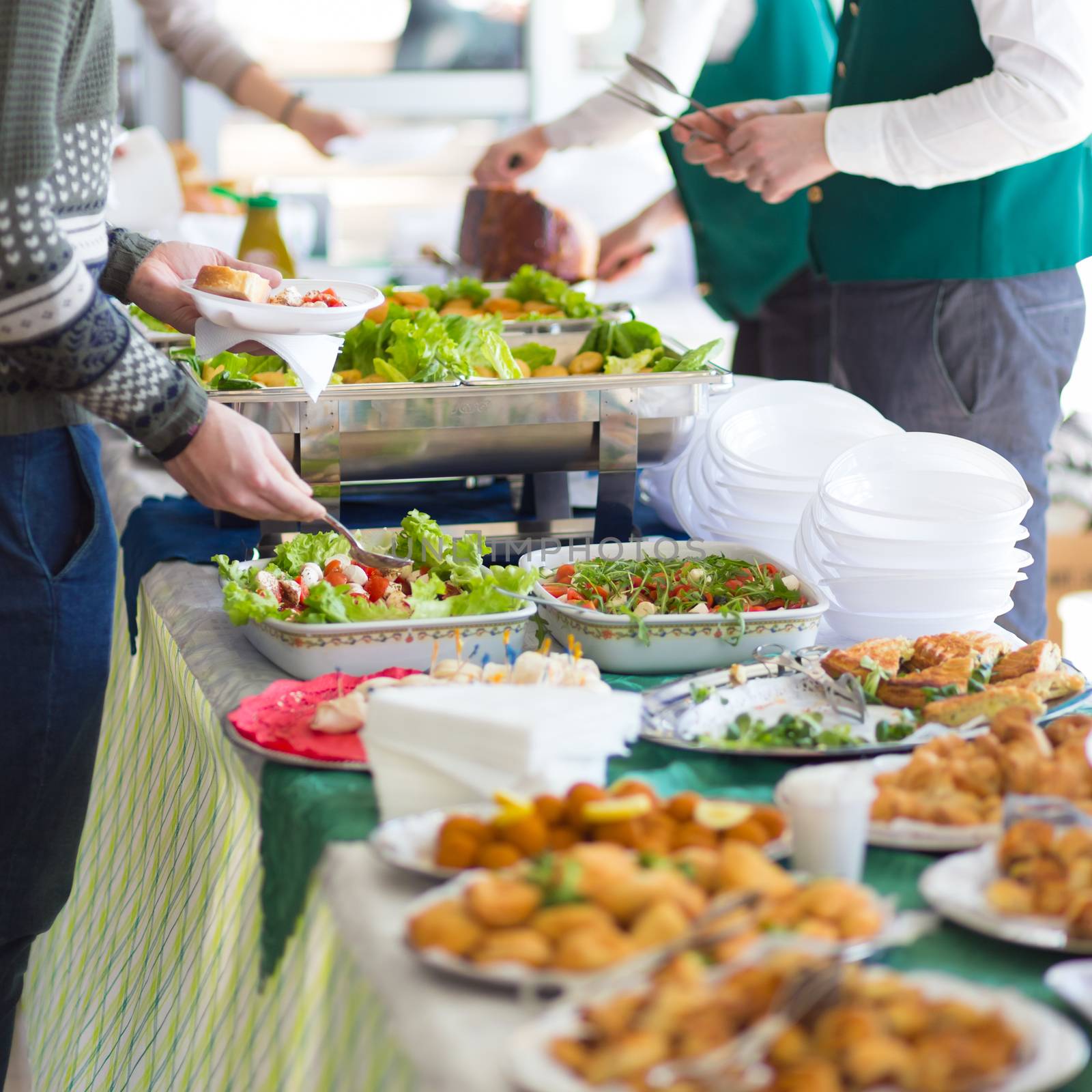 Banquet lunch break at conference meeting. Assortment of food and beverage.