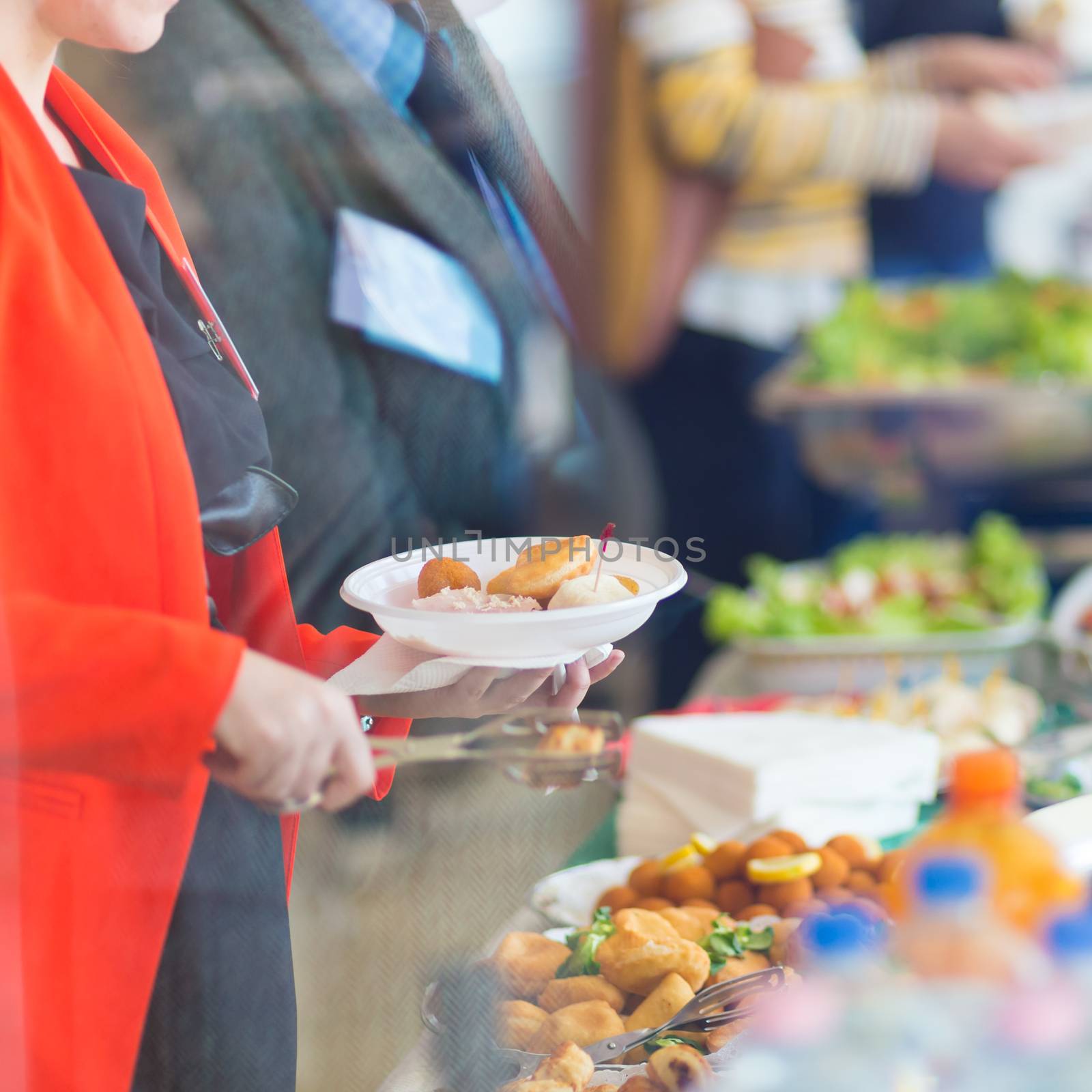 Banquet lunch break at conference meeting. Assortment of food and beverage.