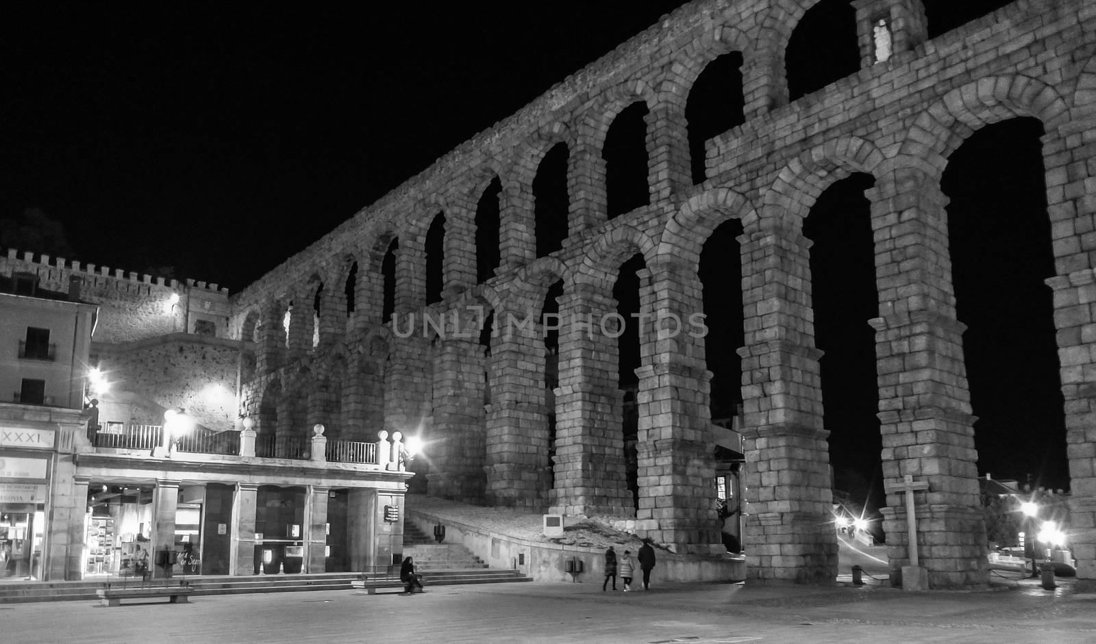 The famous aqueduct of Segovia, Spain at night.