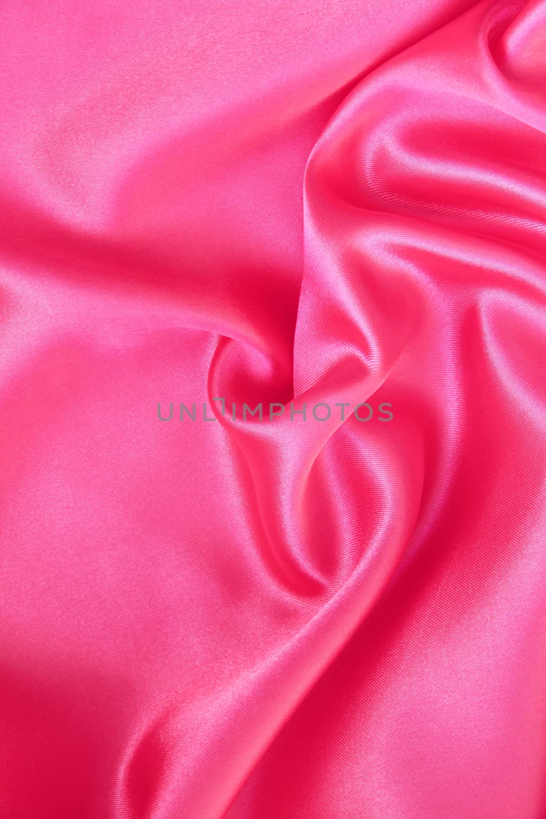 Smooth elegant pink silk or satin can use as background 