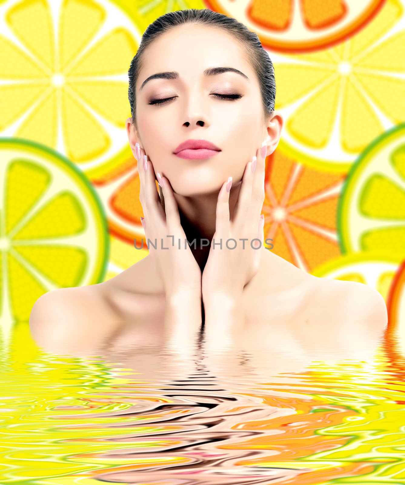 Good looking female on a background with orange slices