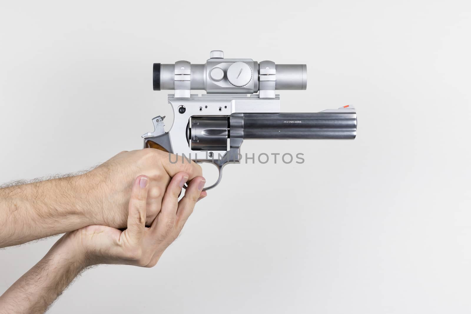 Shooter holds .357 Magnum Revolver by MarkDw