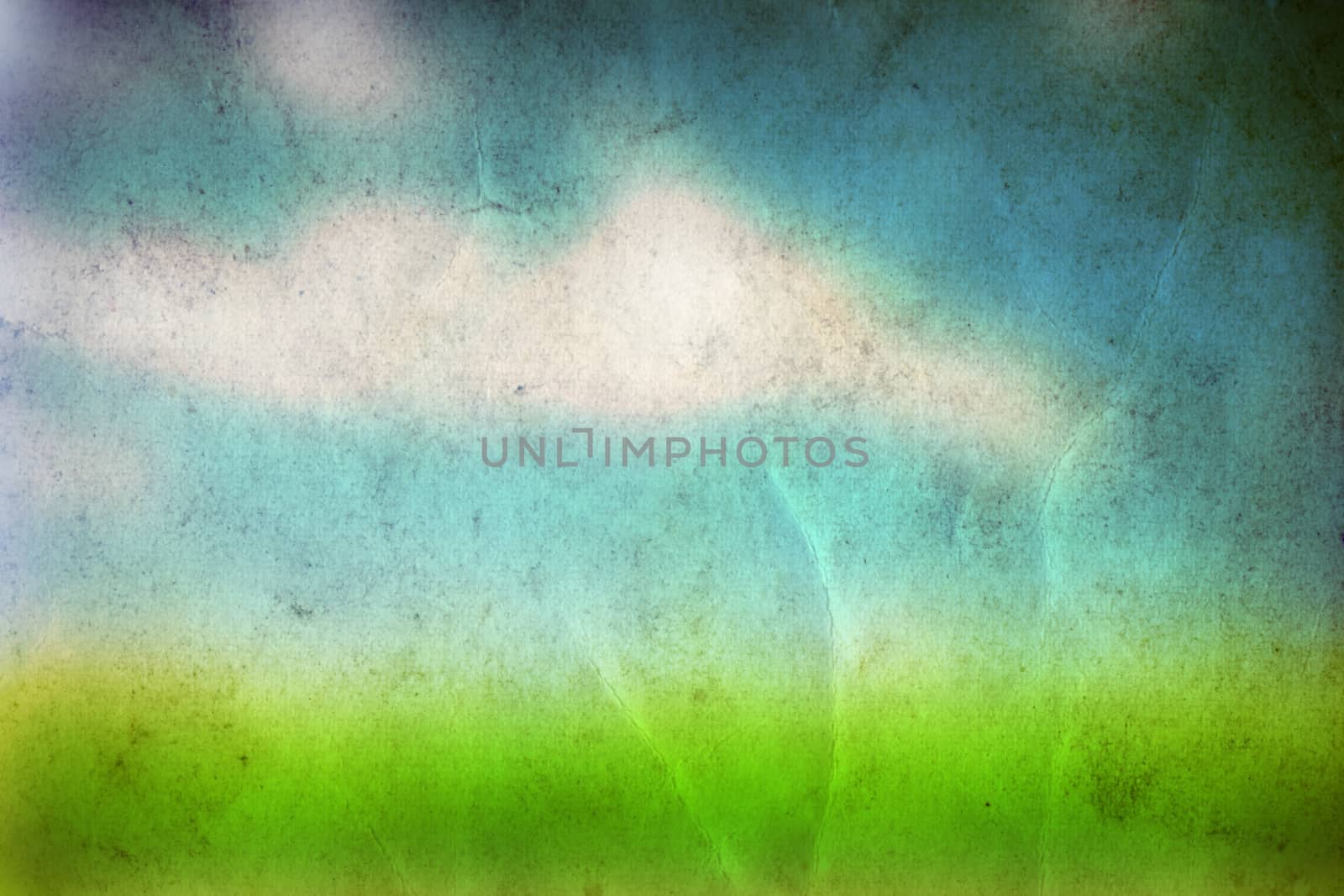Conceptual green grass and sky old paper by design36