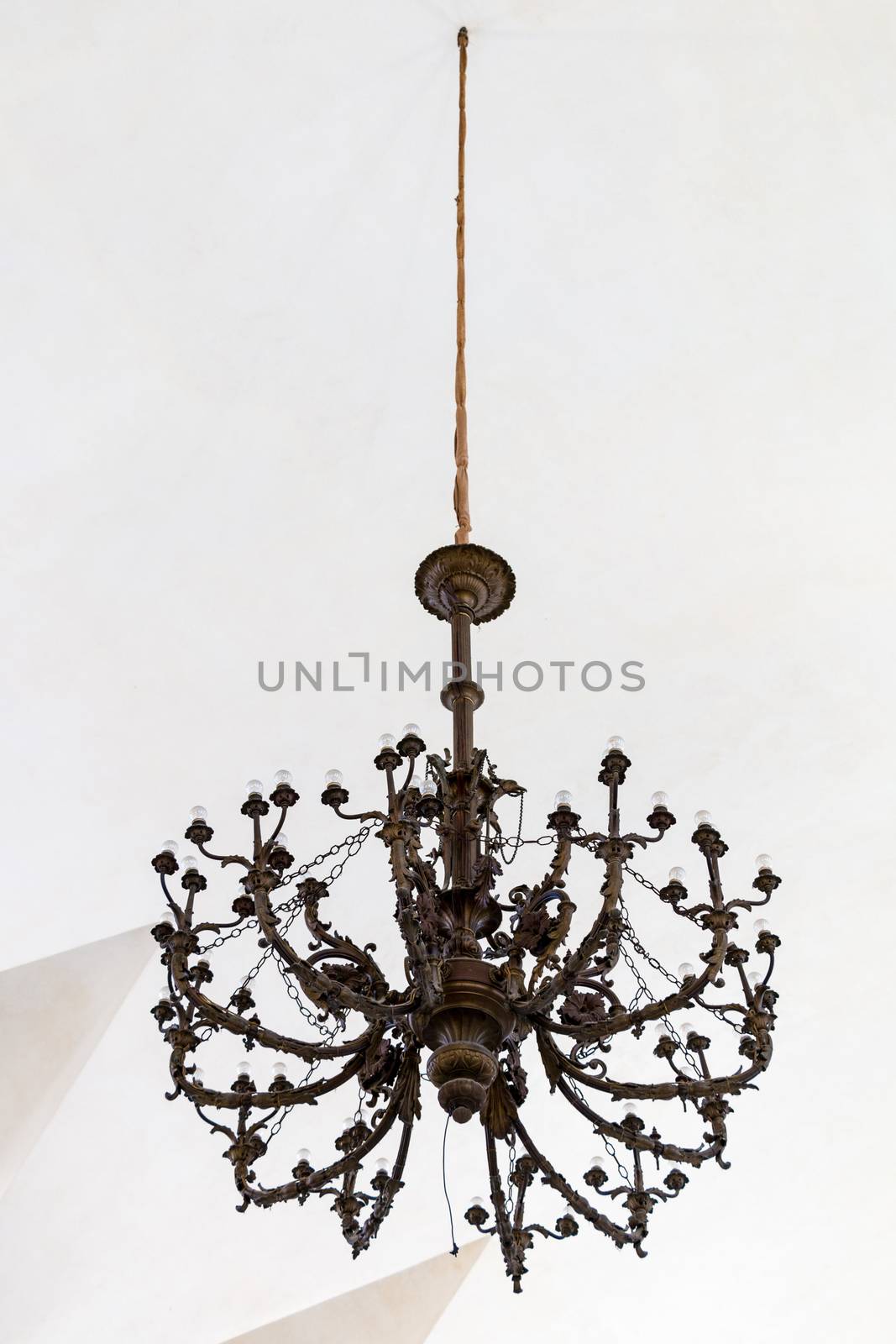 Antique chandelier in Caltagirone Gallery made of wood