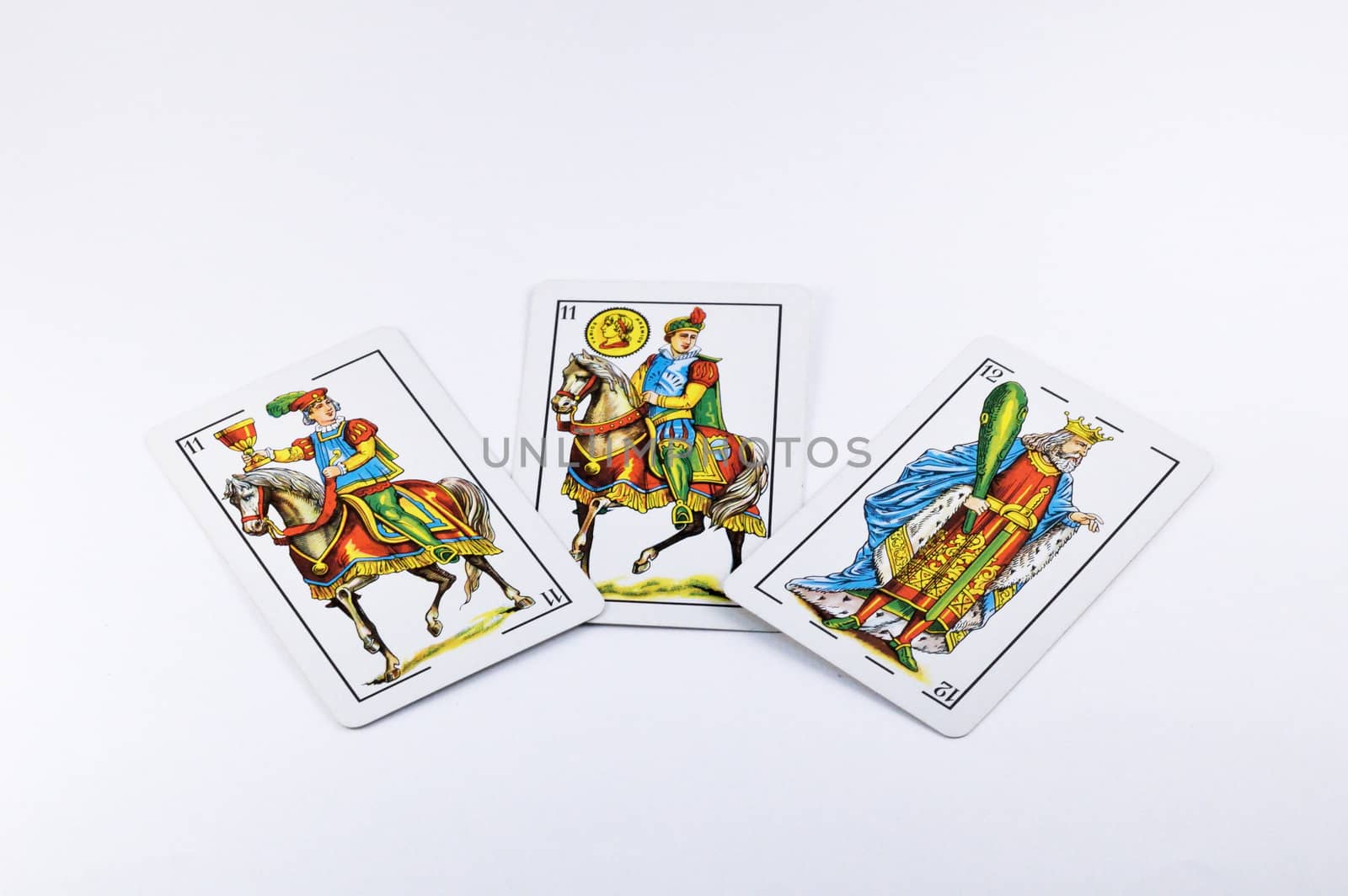 Three Spanish playing cards isolated