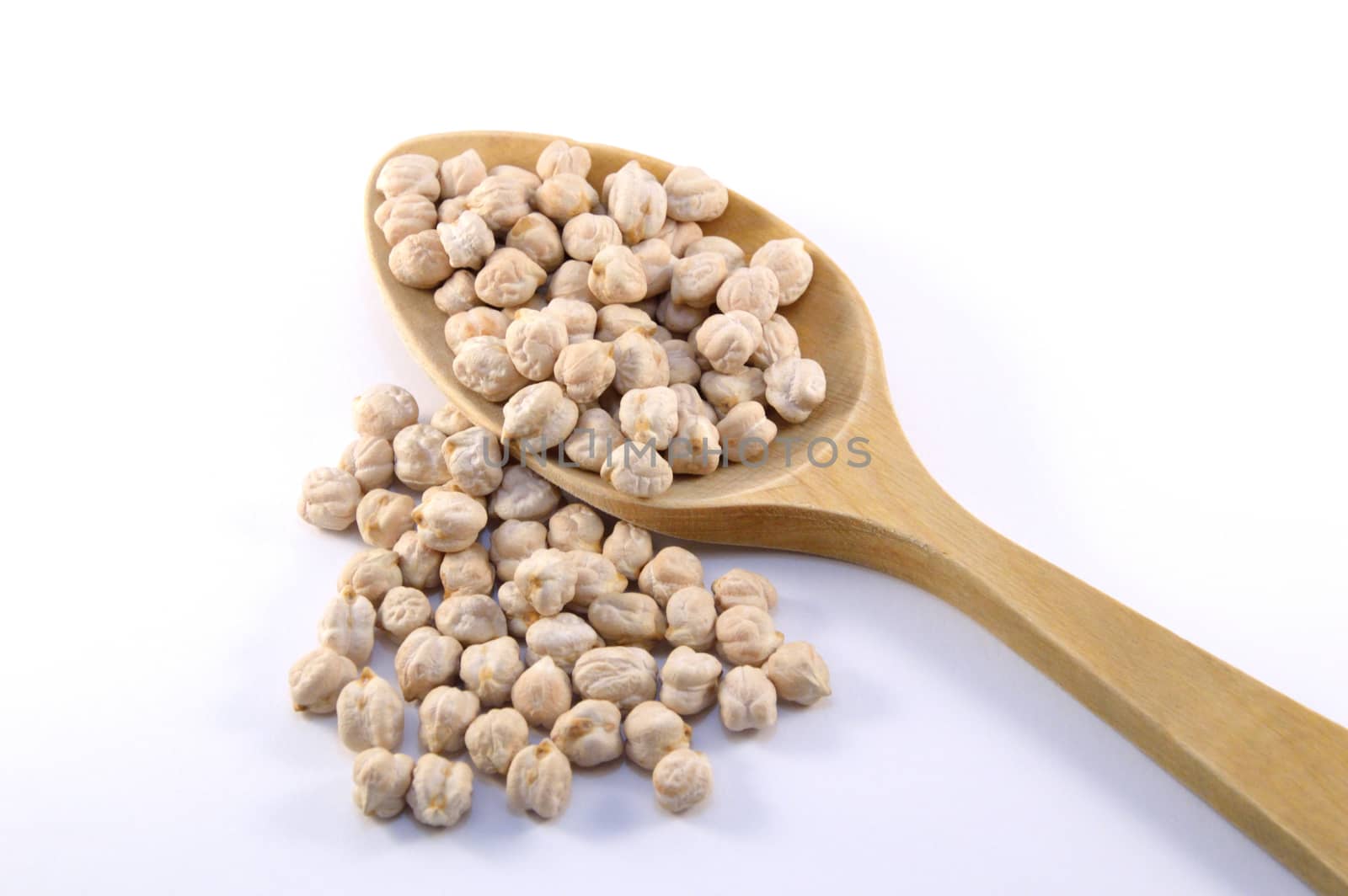 Chickpeas raw and wooden spoon 
