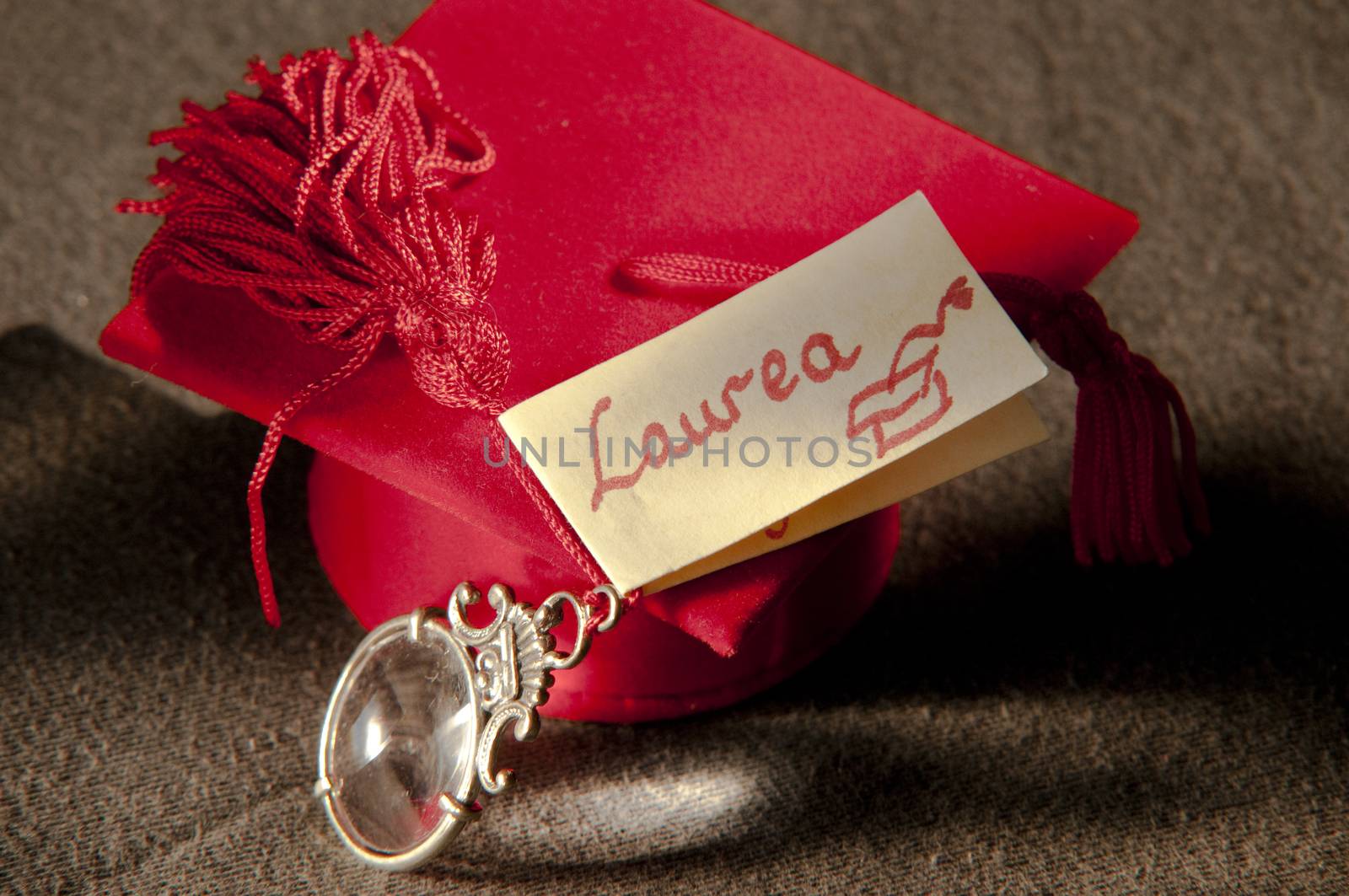 favors red and confetti to celebrate reaching the end of the university