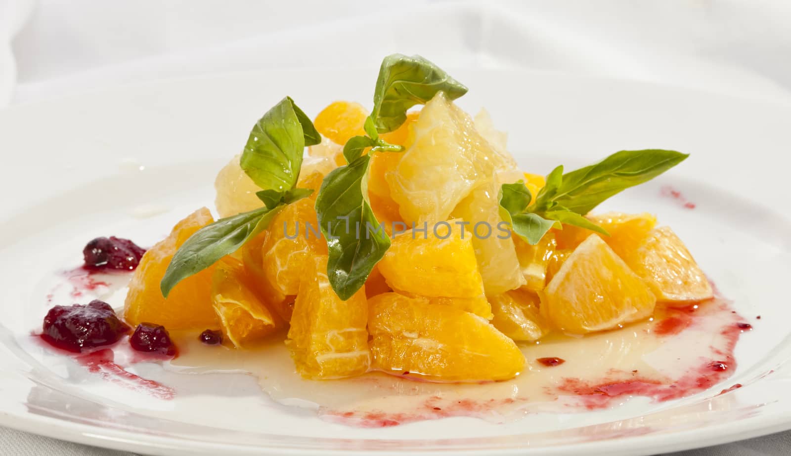 Fruit salad mixed from oranges and grapefruits