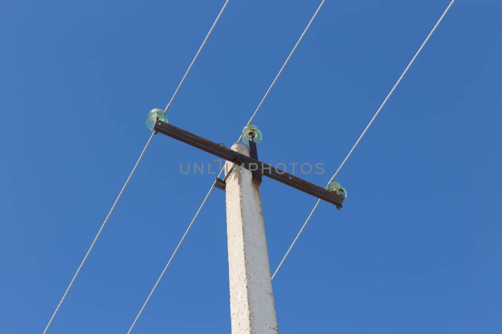 high-voltage line on the background of blue sky