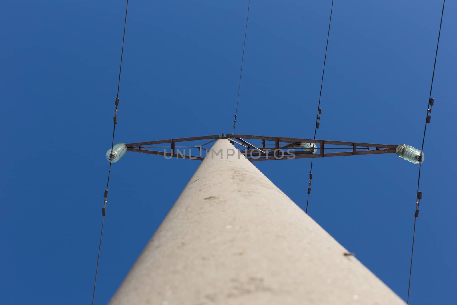 high-voltage line on the background of blue sky