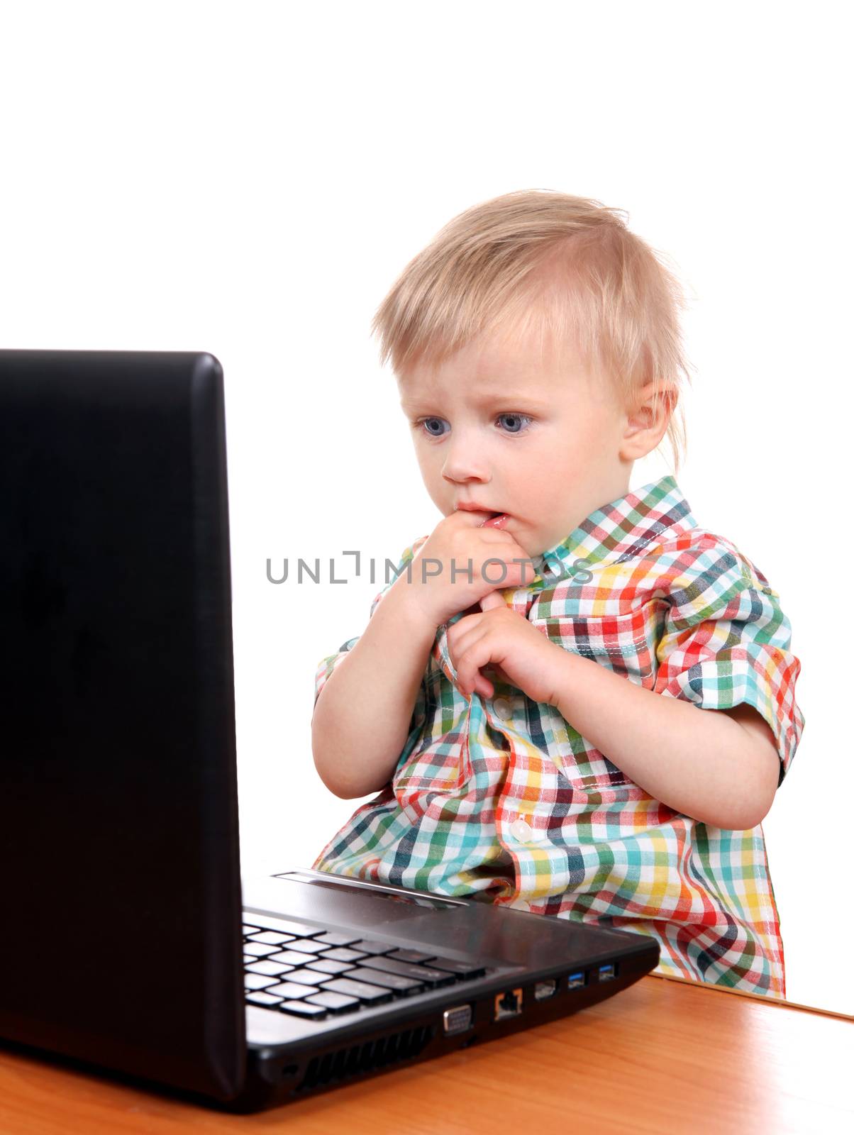 Surprised Baby Boy with Laptop Isolated on the White Background