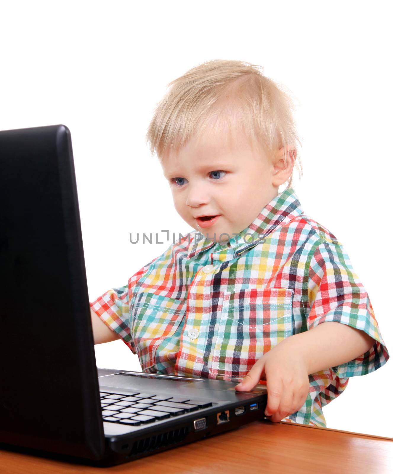 Little Child play in Laptop Isolated on the White Background