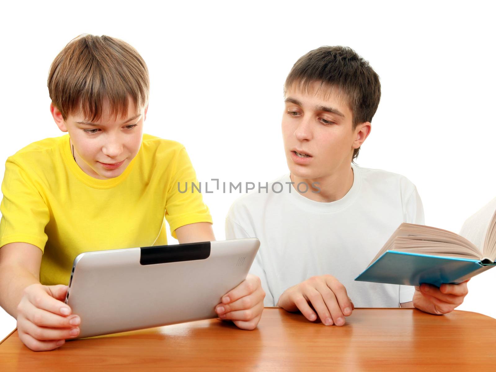 Kid with Tablet and Teenager with the Book on the White Background