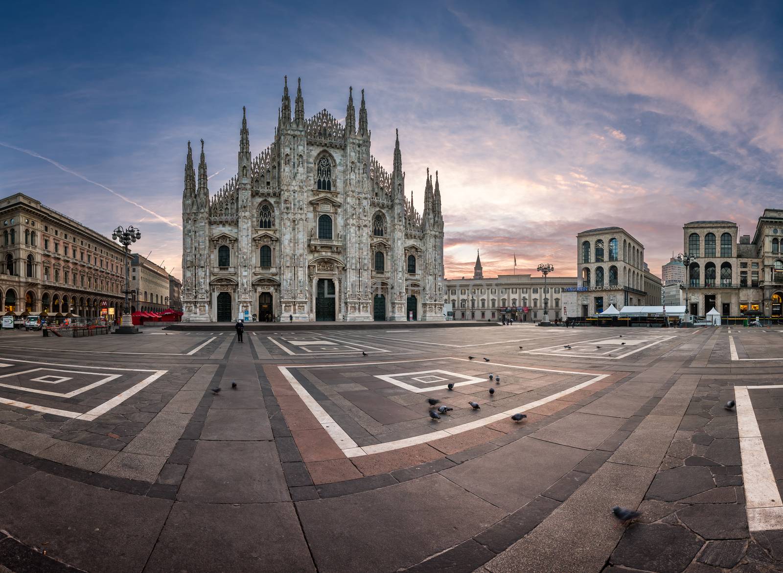 MILAN, ITALY - JANUARY 2, 2015: Milan Cathedral (Duomo di Milano) and Piazza del Duomo in Milan, Italy. Milan's Duomo is the second largest Catholic cathedral in the world.