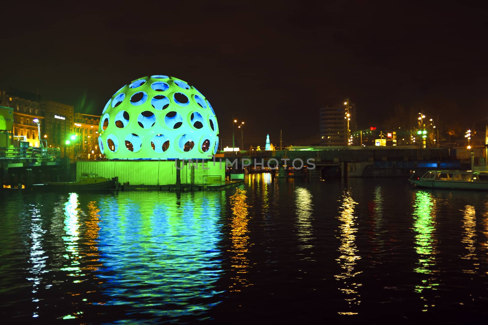 AMSTERDAM, NETHERLANDS - DEC 26 2013: Piece of light art at night during the Amsterdam Light festival in Amsterdam, the Netherlands on December 26, 2013