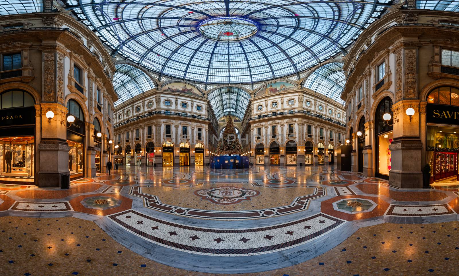 MILAN, ITALY - JANUARY 2, 2015:  Galleria Vittorio Emanuele II in Milan. It's one of the world's oldest shopping malls, designed and built by Giuseppe Mengoni between 1865 and 1877.