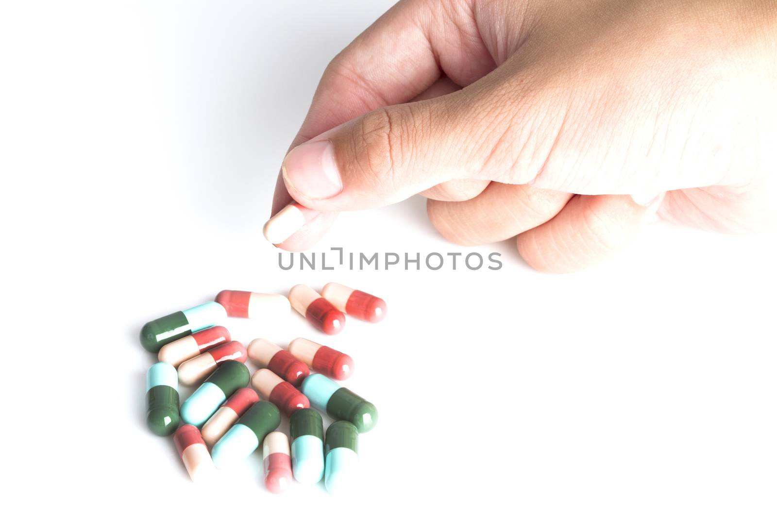 Pills in hand, close-up