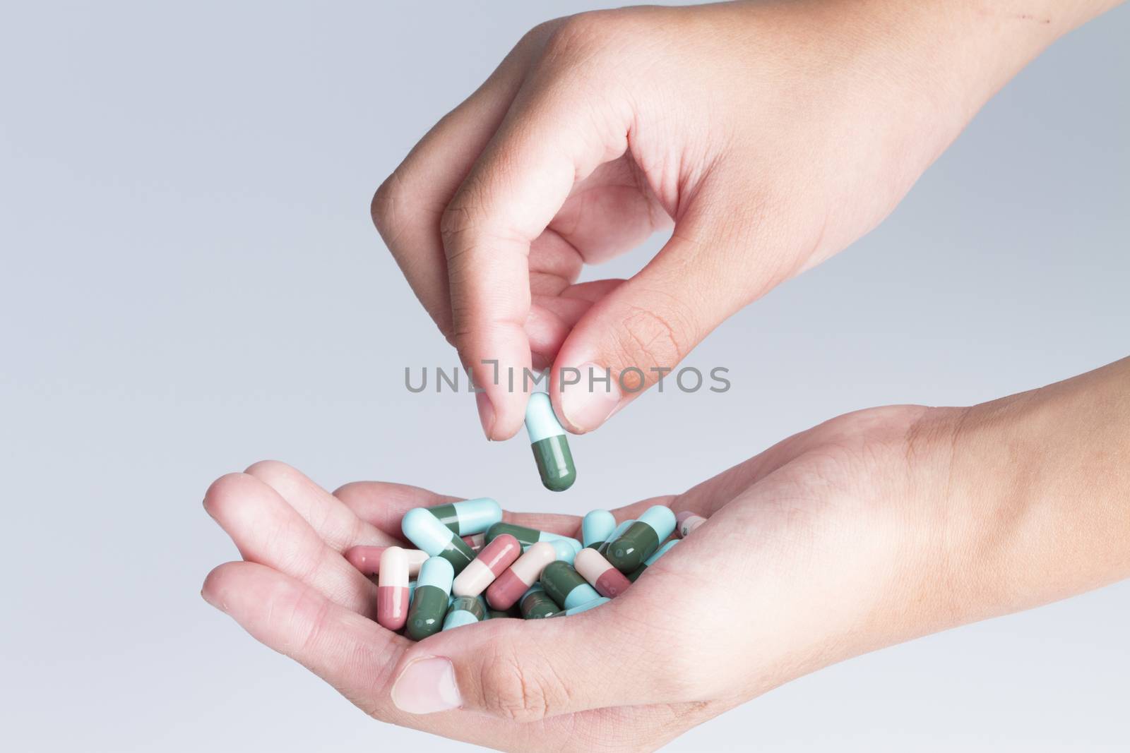 Pills in hand, close-up