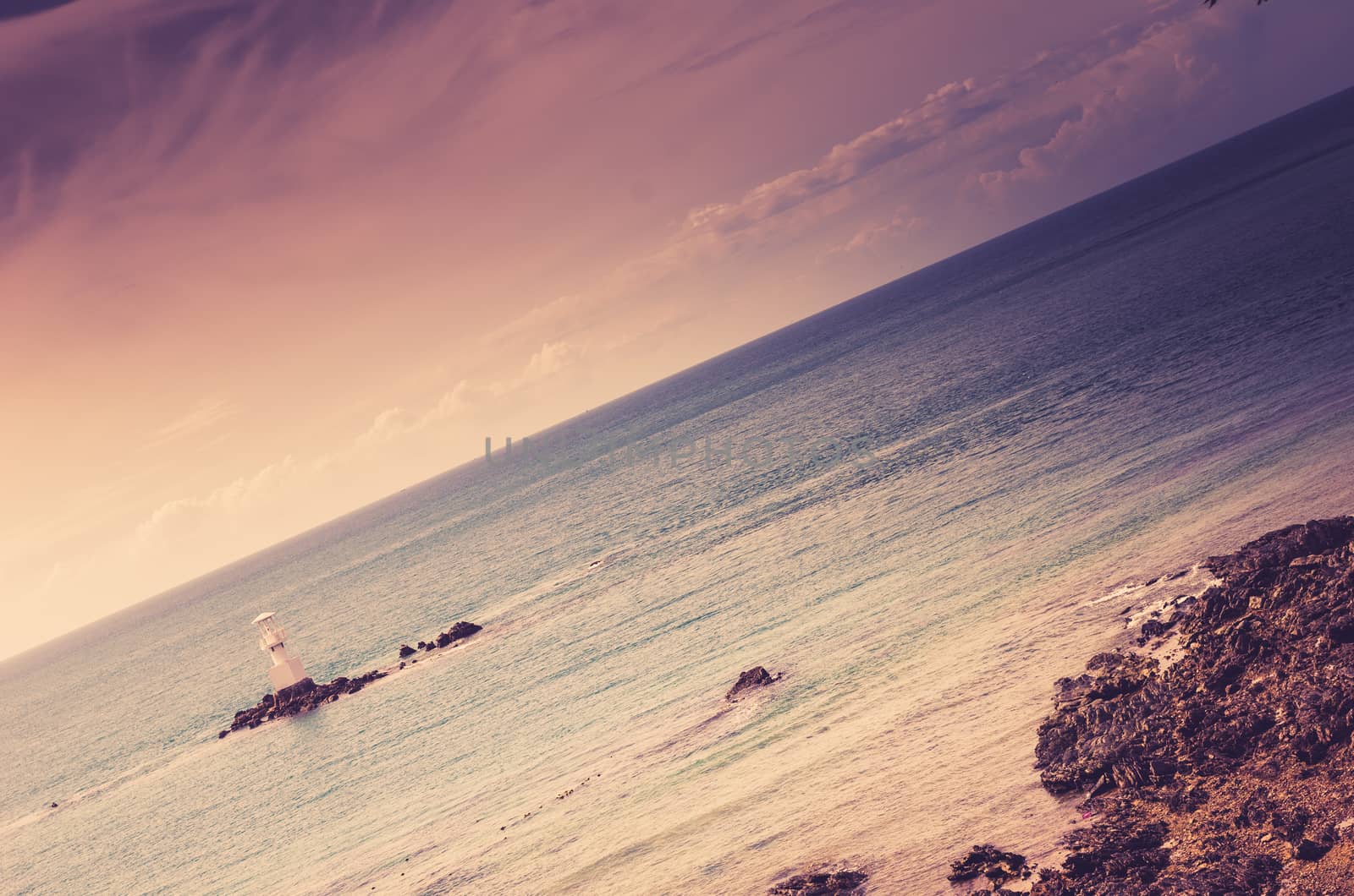 White Lighthouse on the sea and blue sky in Thailand vintage by sweetcrisis