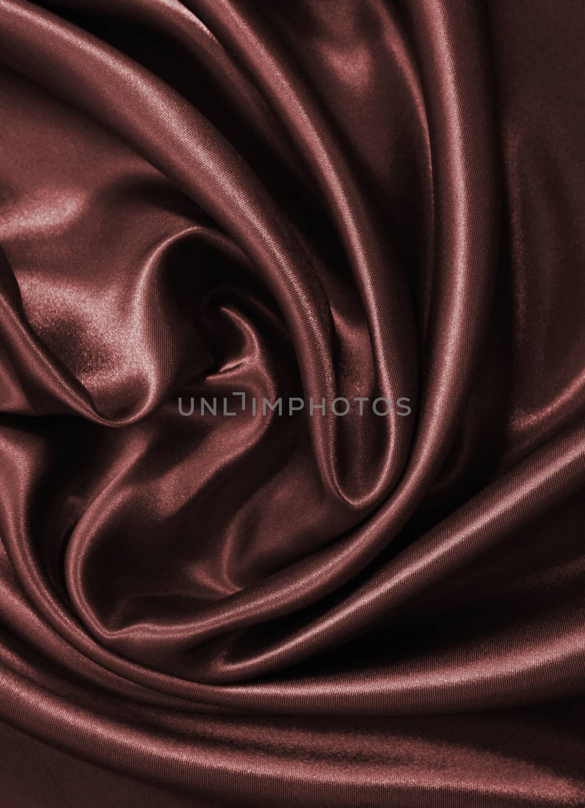 Smooth elegant dark brown chocolate silk can use as background 