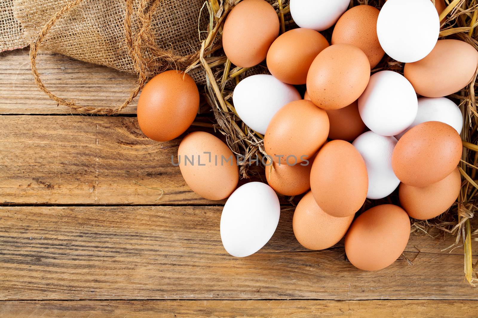 Eggs on wooden background