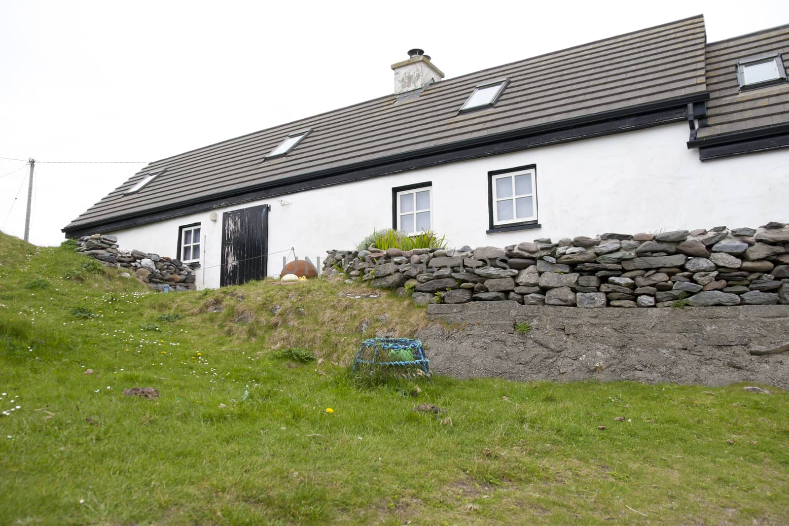 white coastal seaside cottage in county Kerry Ireland