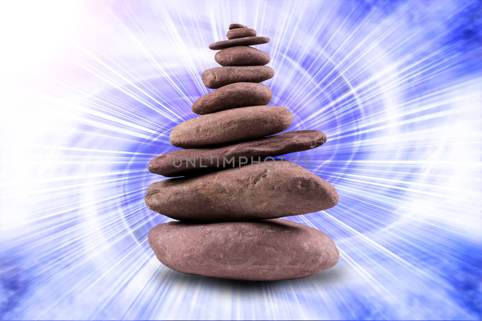 Zen like, balanced stone tower with a background.