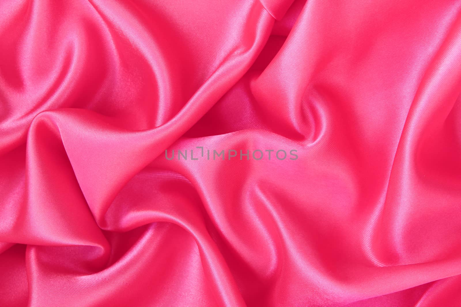 Smooth elegant pink silk or satin can use as background 