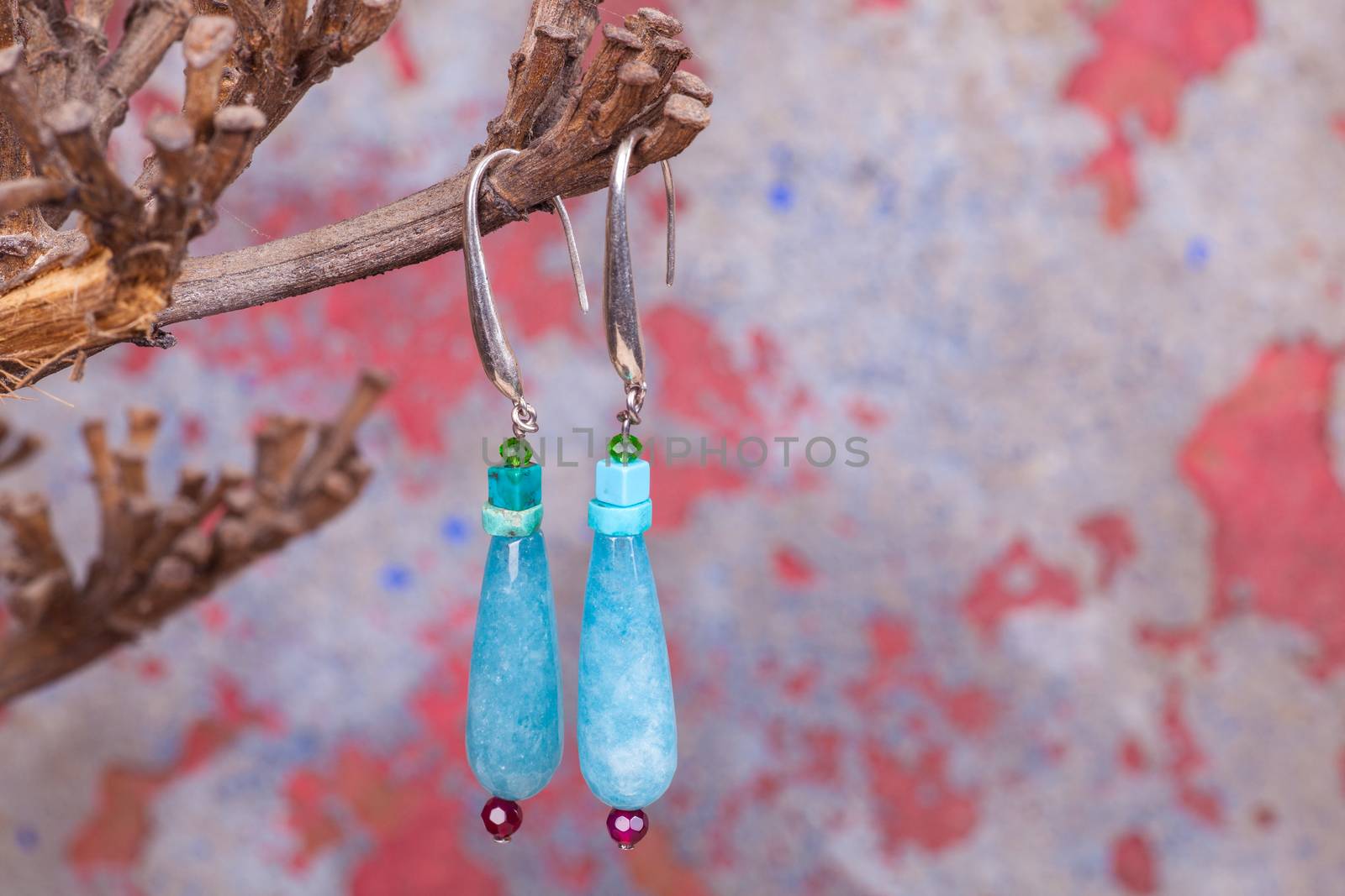 Close up of chalcedony earrings by bepsimage