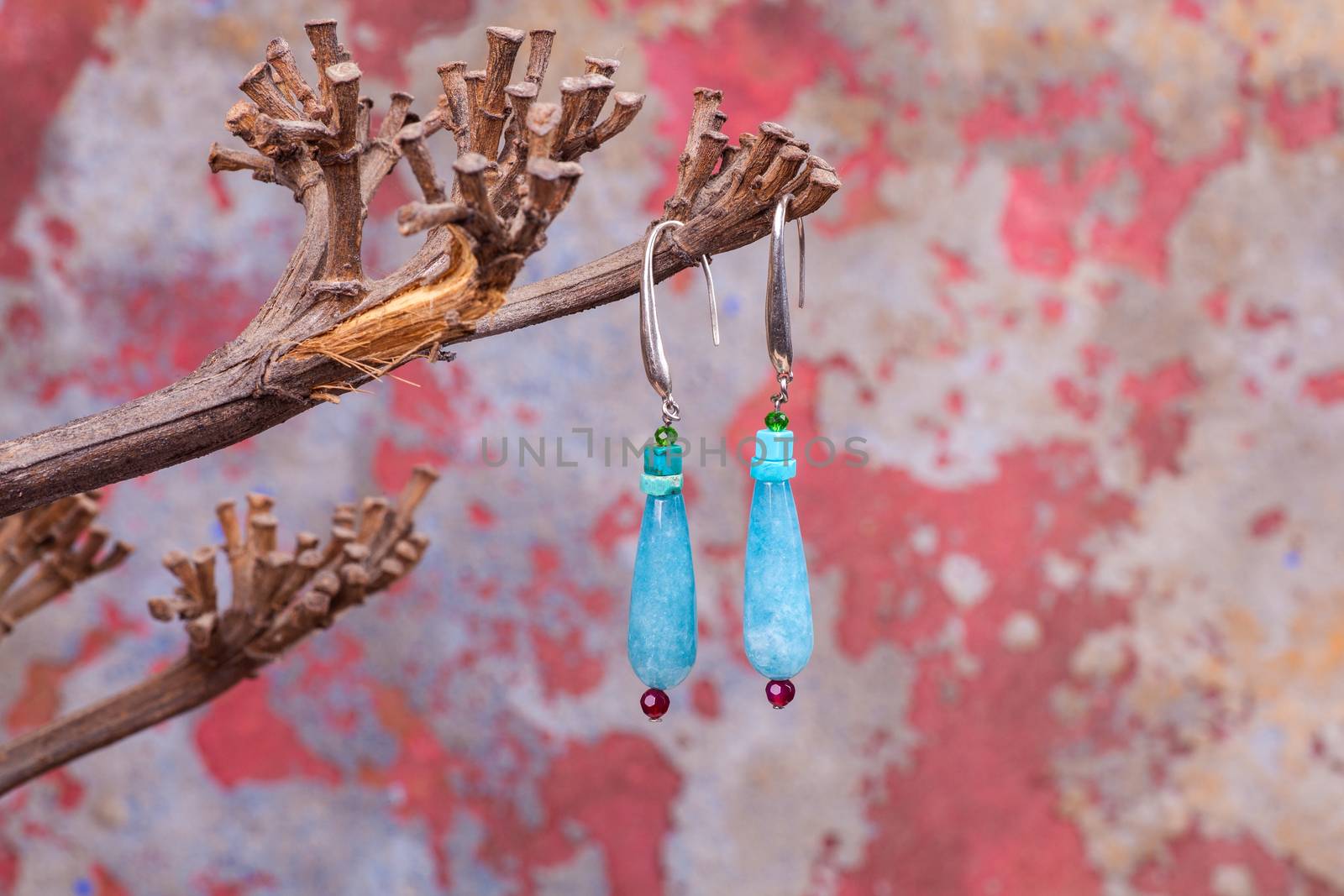 Close up of chalcedony earrings by bepsimage