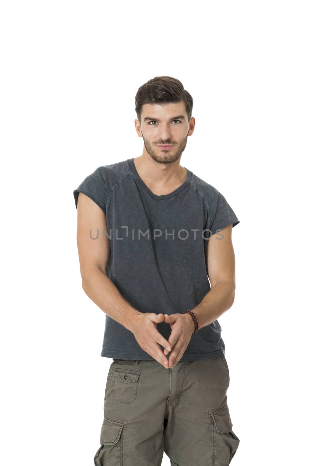 Handsome bearded young man with a lovely charismatic smile wearing a cotton t-shirt, isolated on white