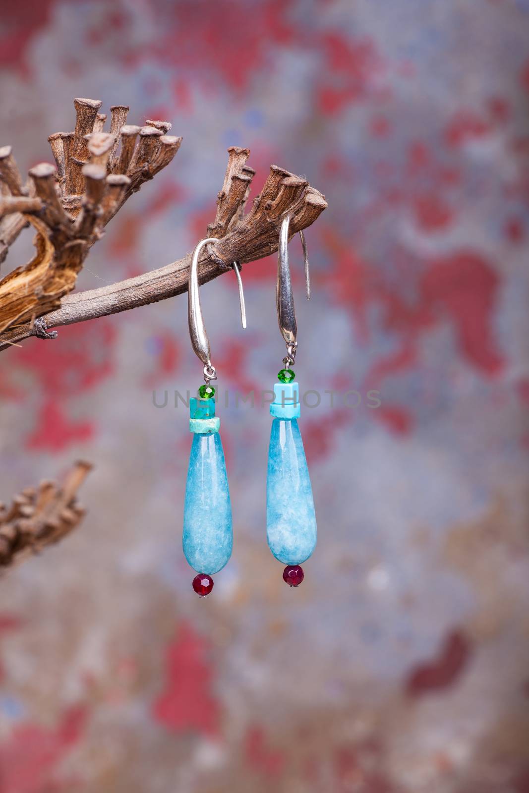 Close up of chalcedony earrings by bepsimage