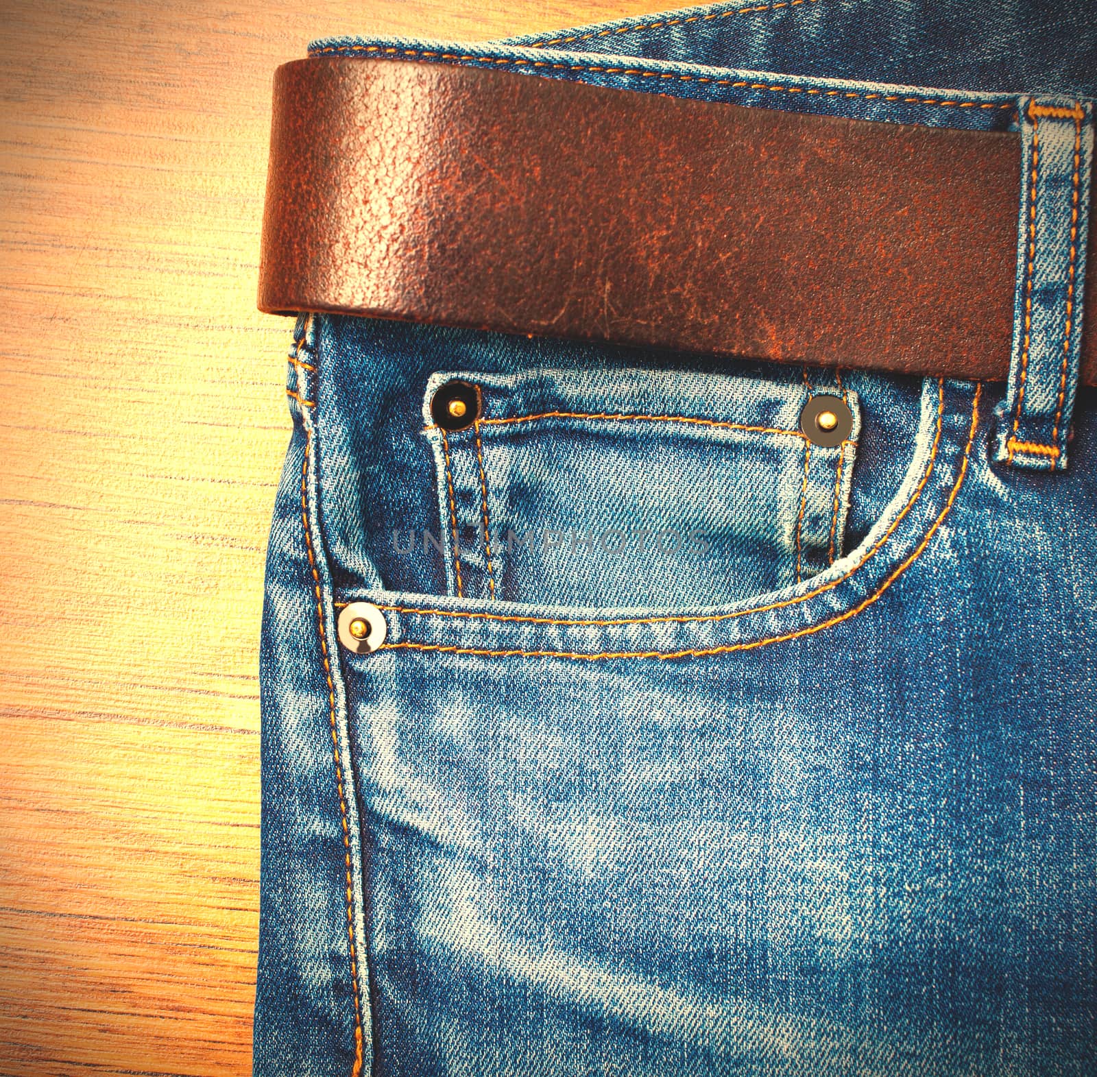 jeans with leather belt, aged and blue. Instagram image style