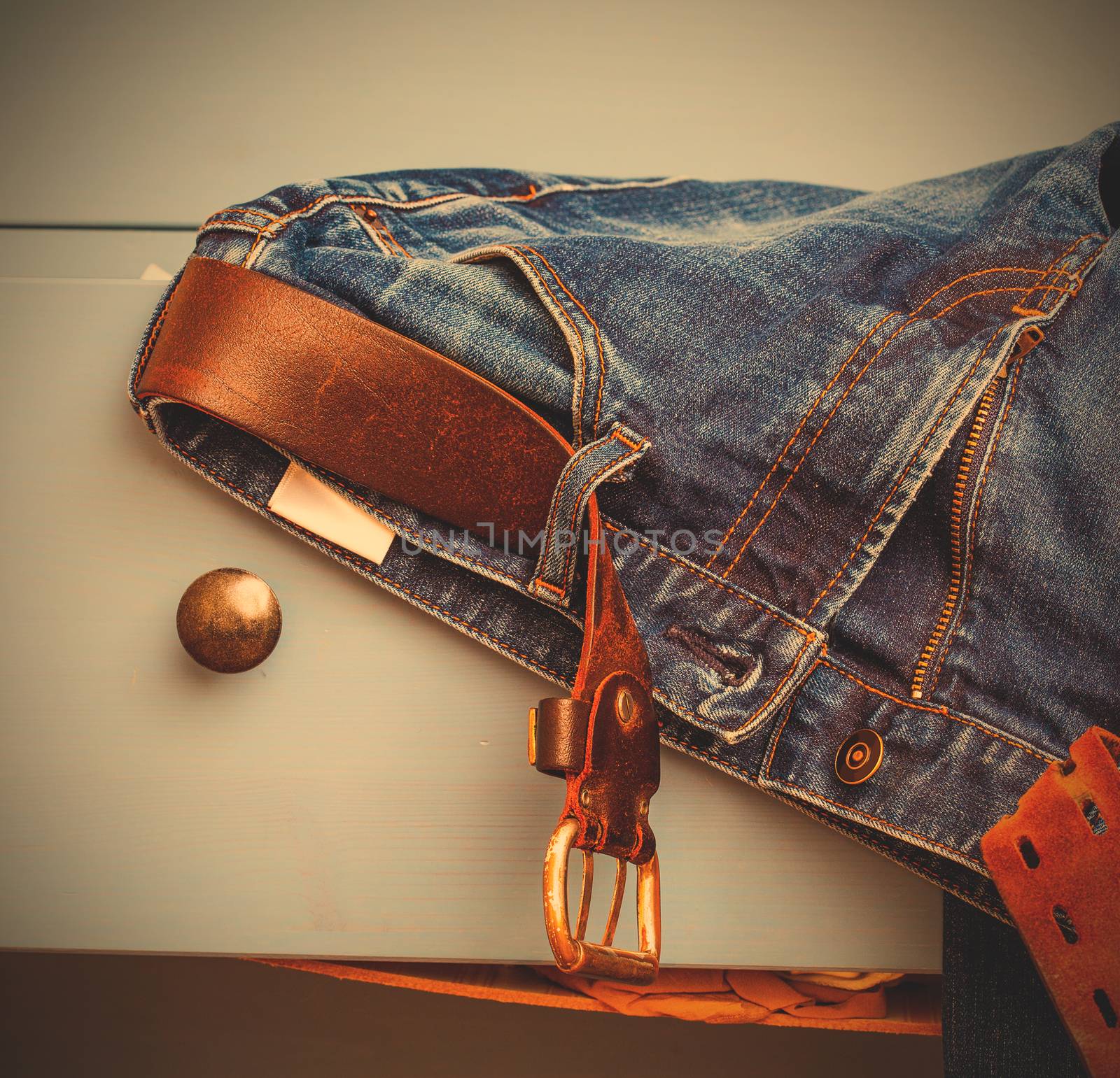 jeans sticking out of a drawer, instagram image style