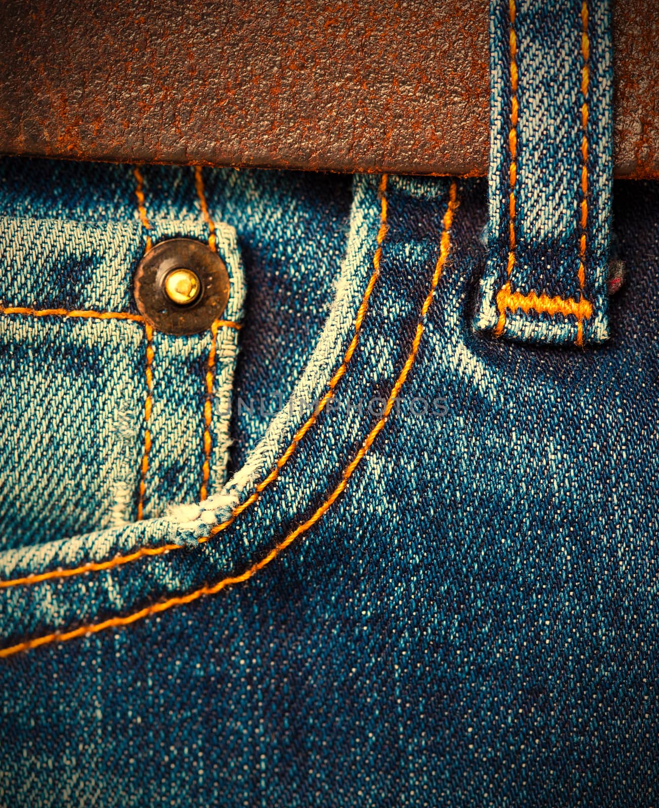 part of a blue vintage jeans with leather belt. instagram image retro style