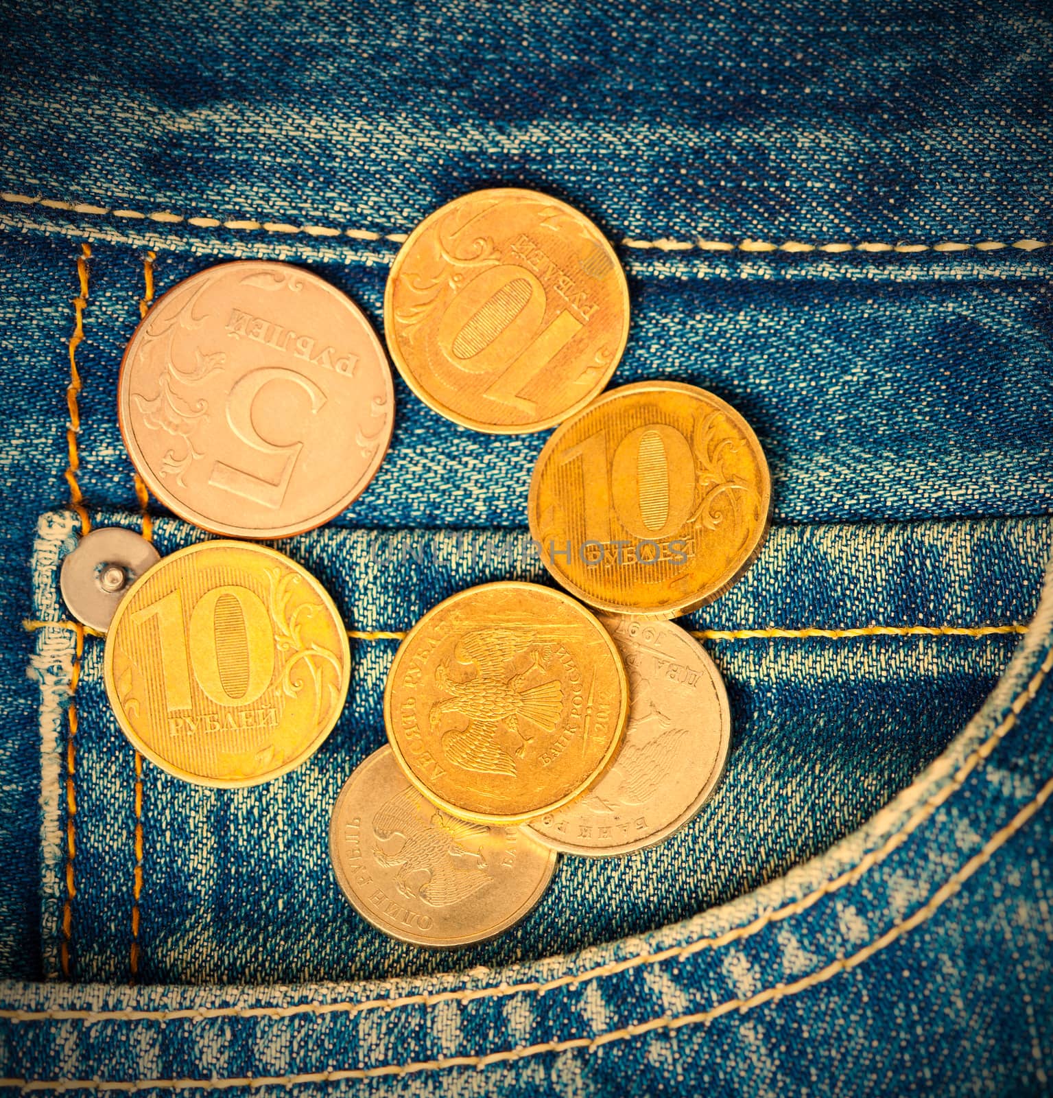 Coins and pocket jeans by Astroid