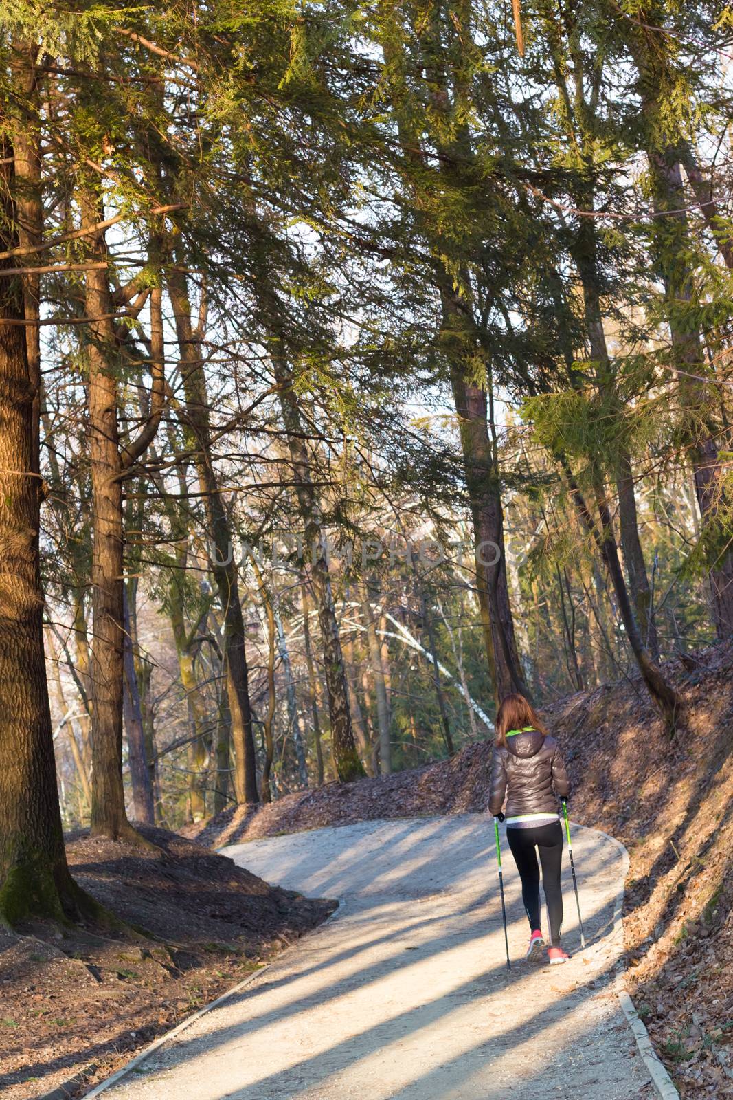 Woman hiking in nature.  by kasto