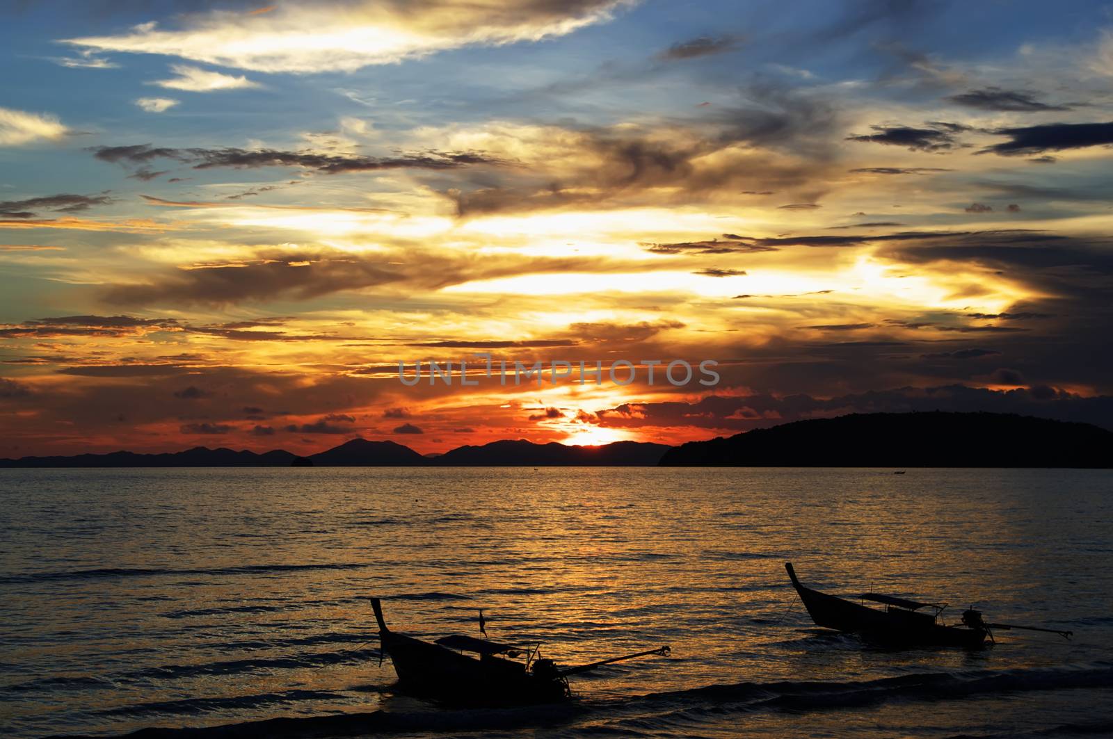 Sunset on Andaman sea, Ao Nang beach, Thailand. by HGalina