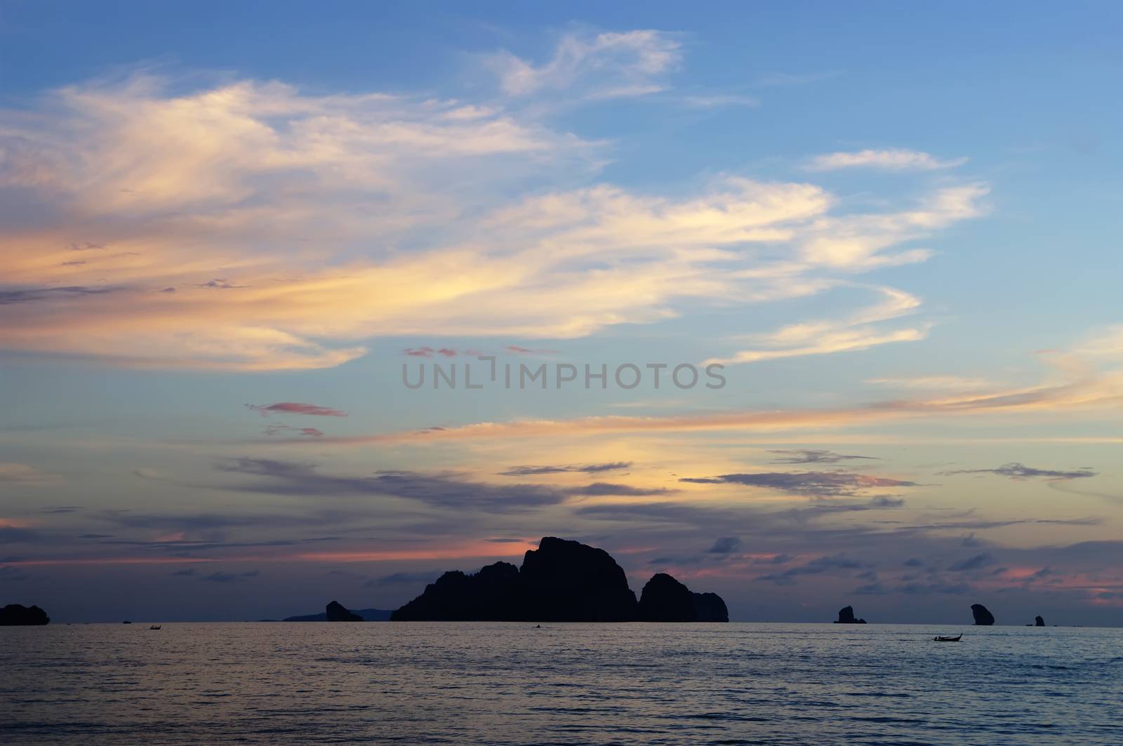 Sunset on Andaman sea, Ao Nang beach, Thailand. by HGalina