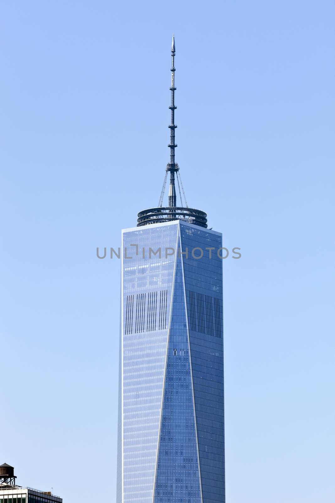 New York, USA, October 3, 2014: The top of the Freedom Tower with 408 feet (124 m) mast containing the broadcasting antenna gave the tower symbolic height of 1,776 feet (541 m)
