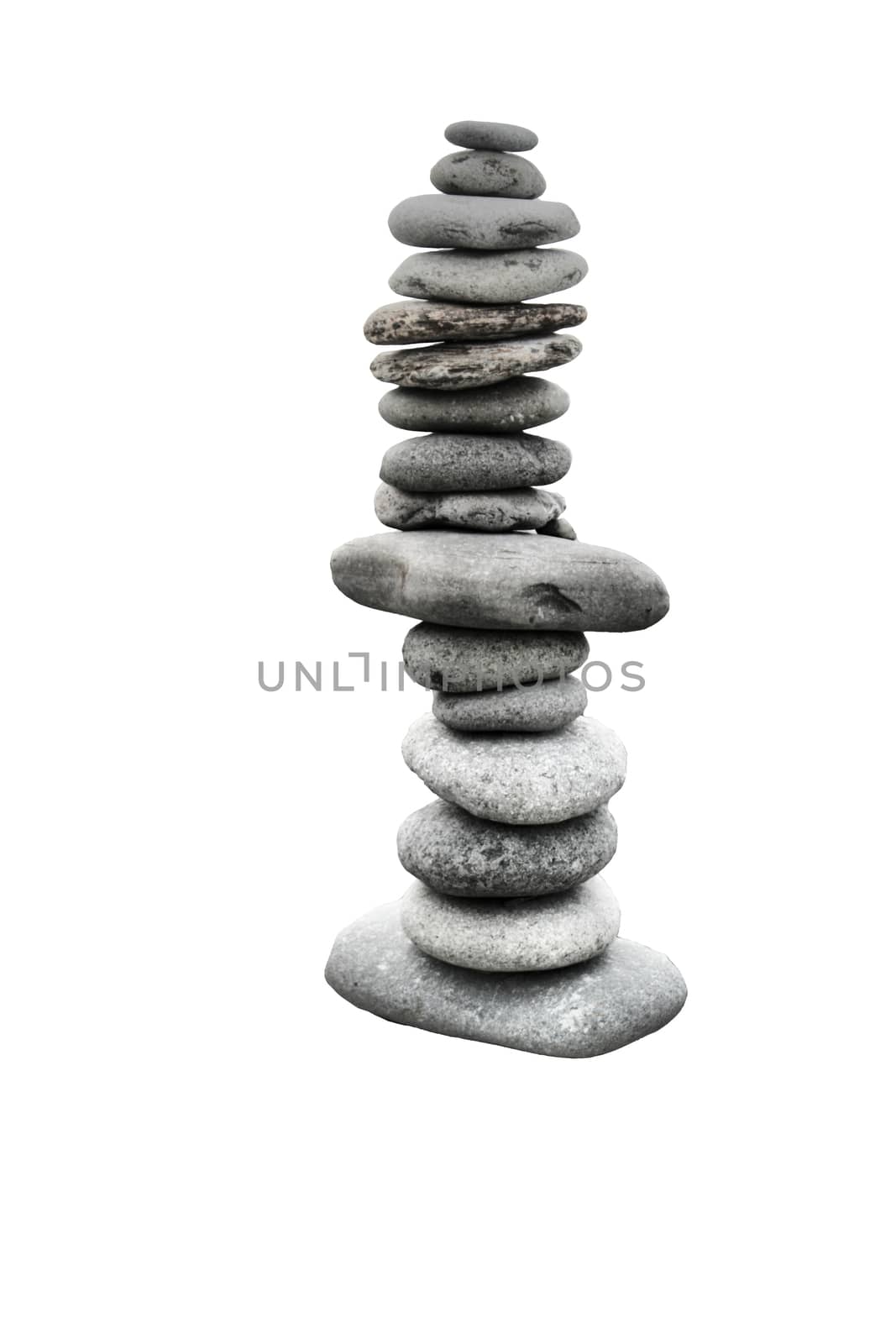 stones balancing on top of each to make a tower on a beach by chrisga