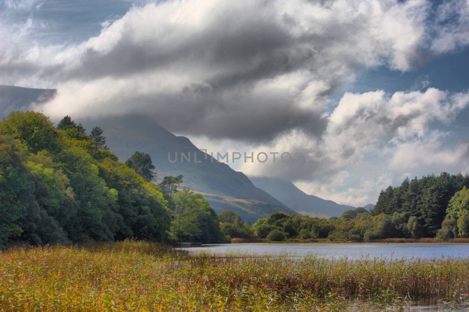 Mountain behind a lake under a moody sky