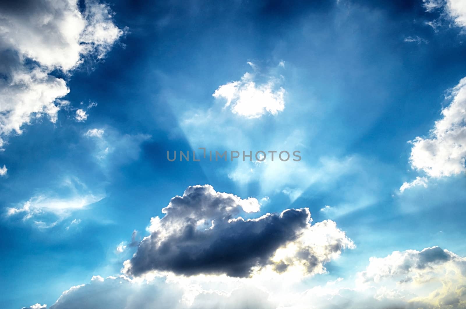 Blue sky with white cloud and sun