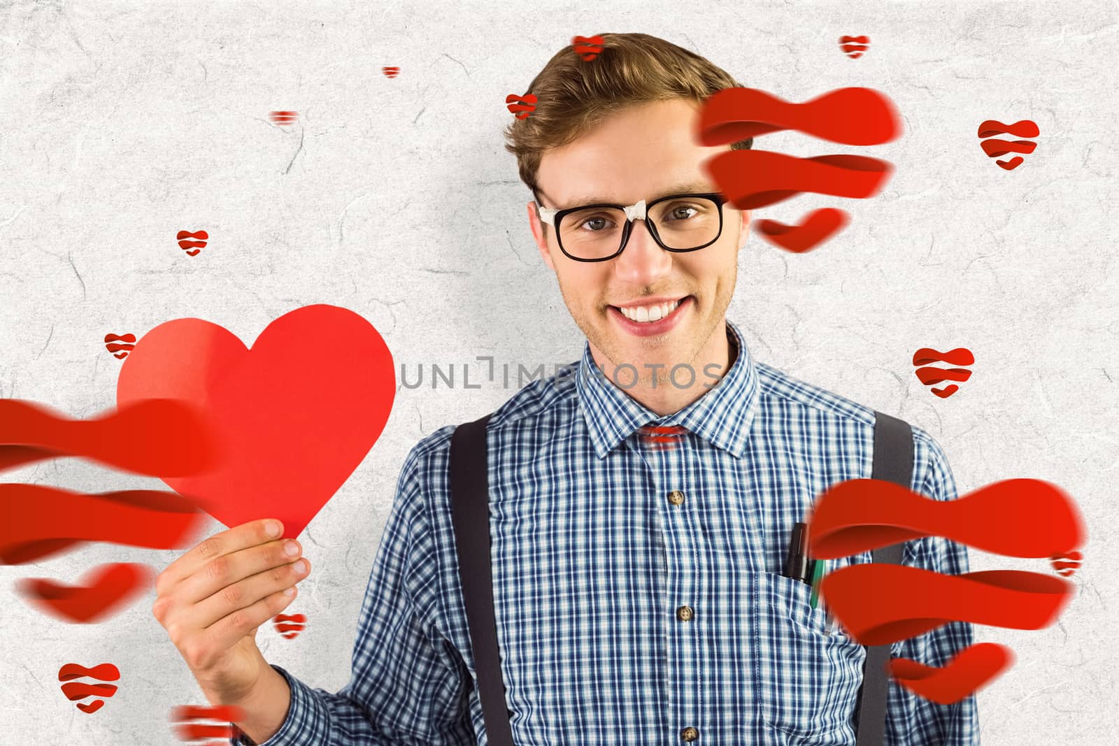 Geeky hipster holding a heart card against parchment