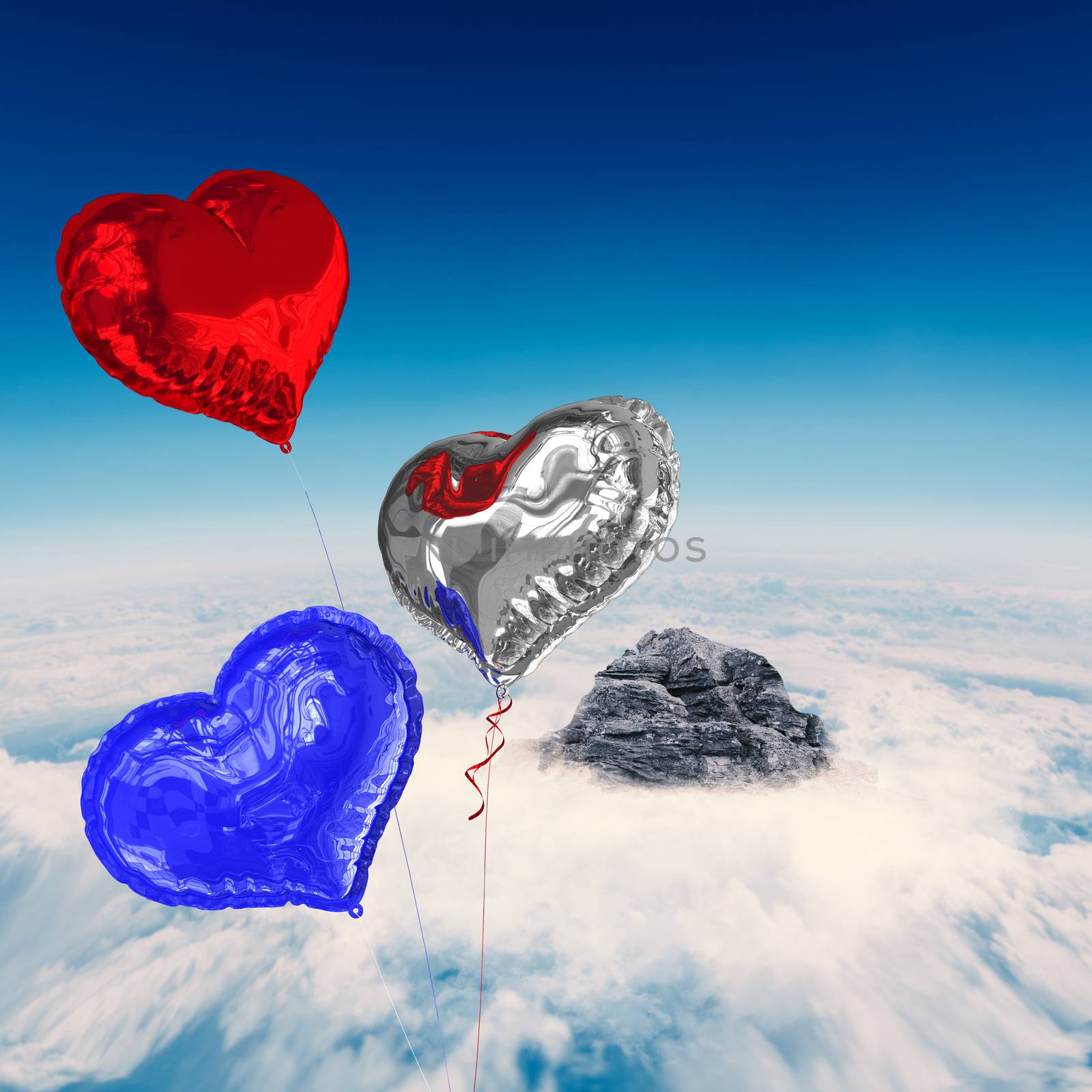 Heart balloons against mountain peak through the clouds